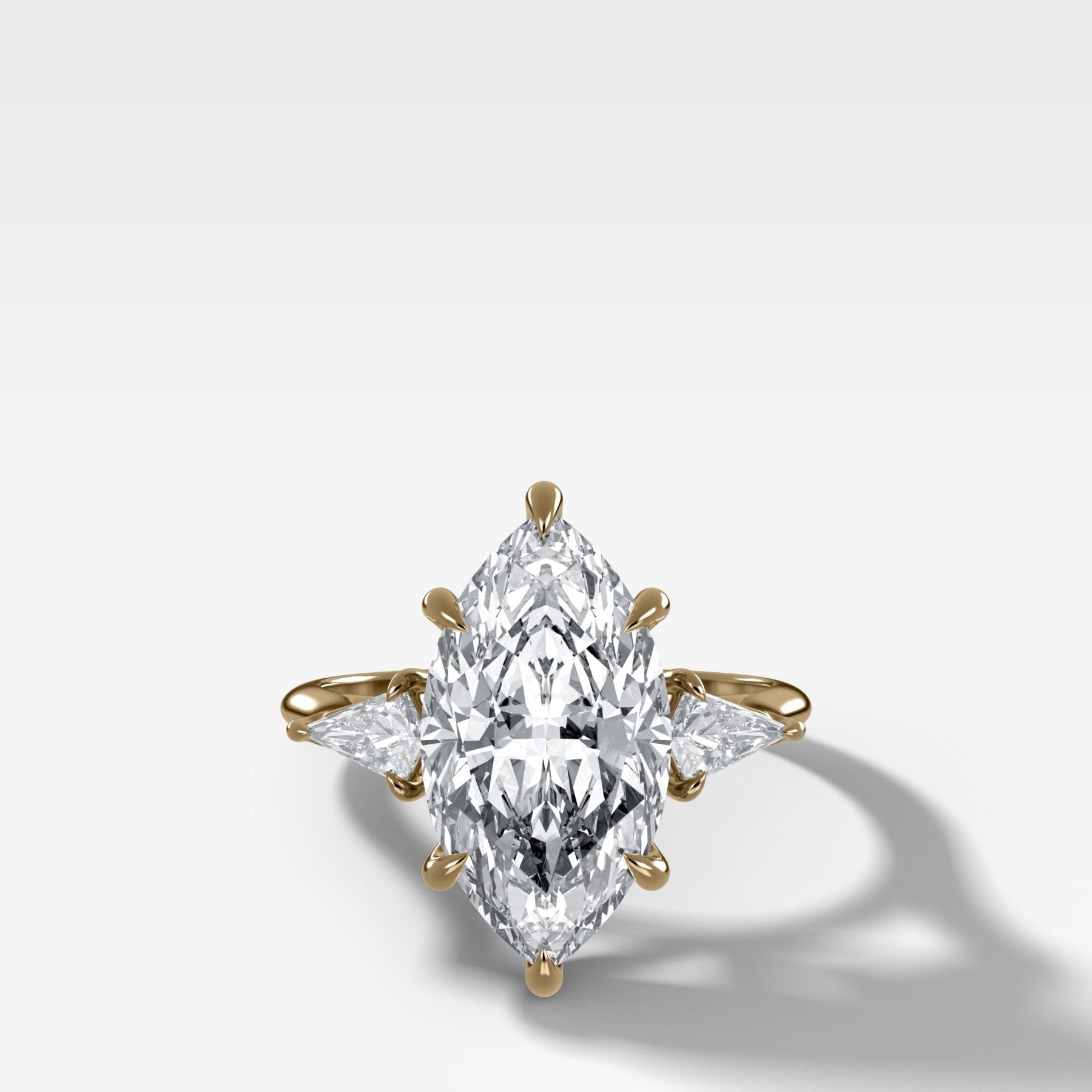 Three Stone Engagement Ring With Kite Side Stones and Marquise Cut Diamond - GOODSTONE