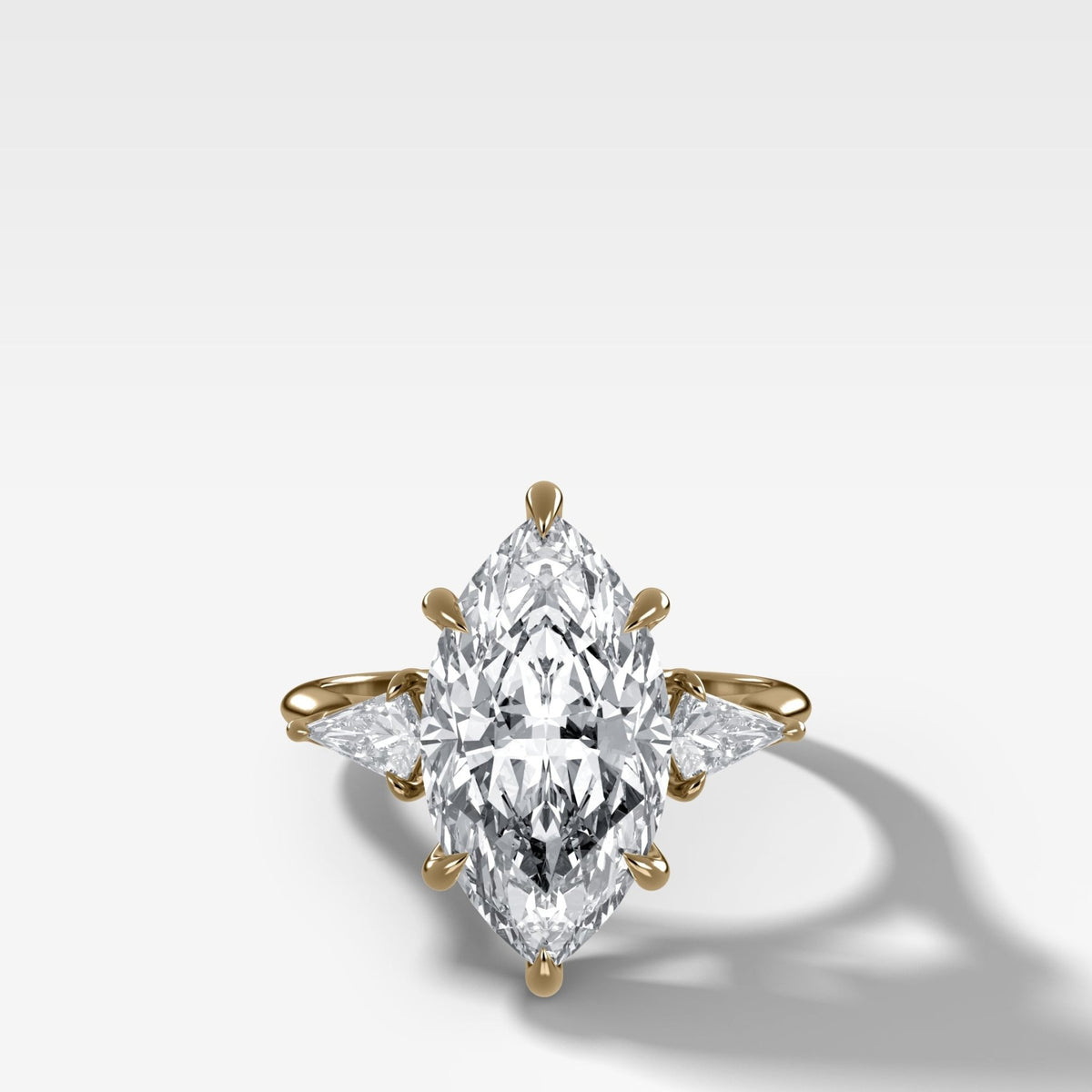 Three Stone Engagement Ring With Kite Side Stones and Marquise Cut Diamond - GOODSTONE