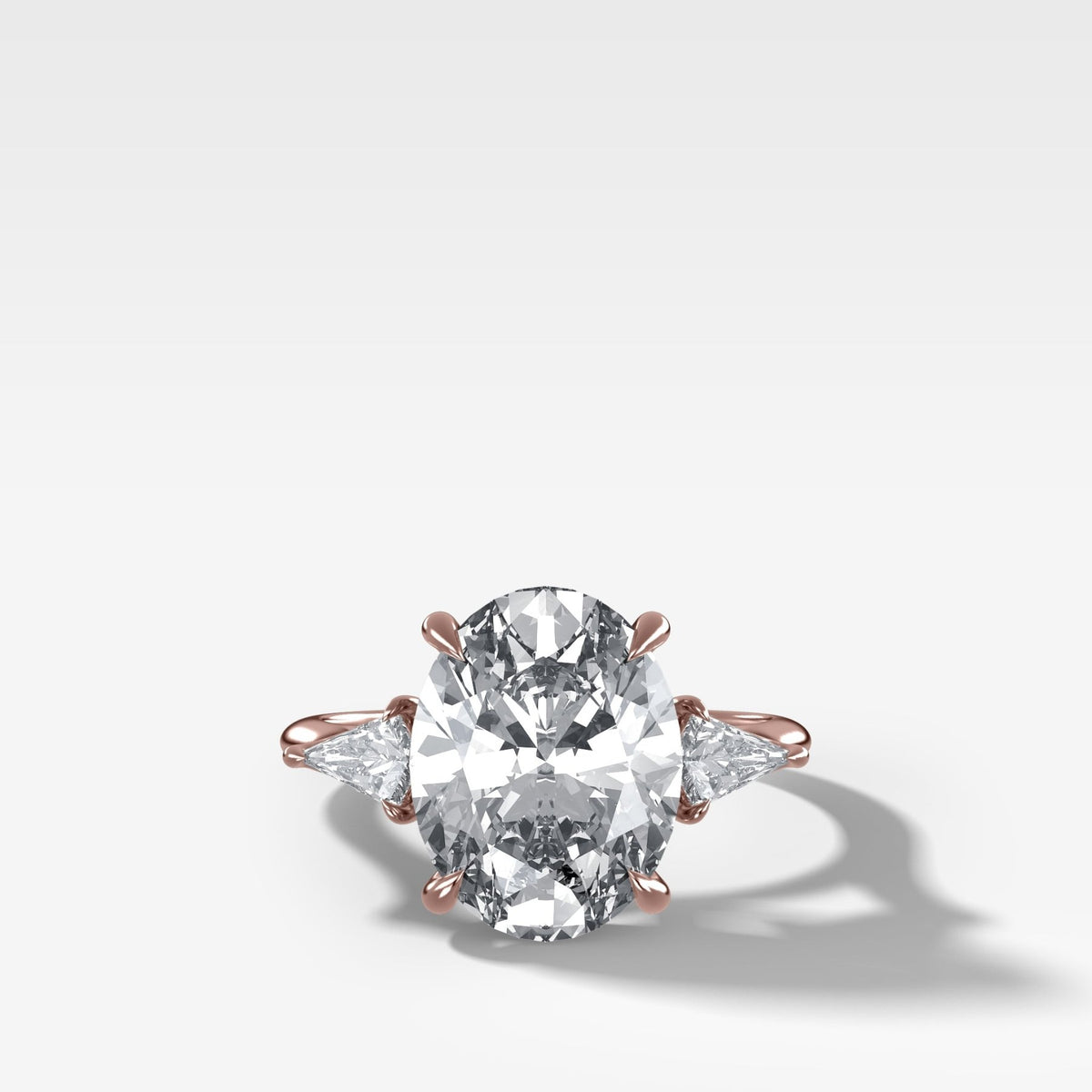 Three Stone Engagement Ring With Kite Side Stones and Oval Cut Diamond - GOODSTONE