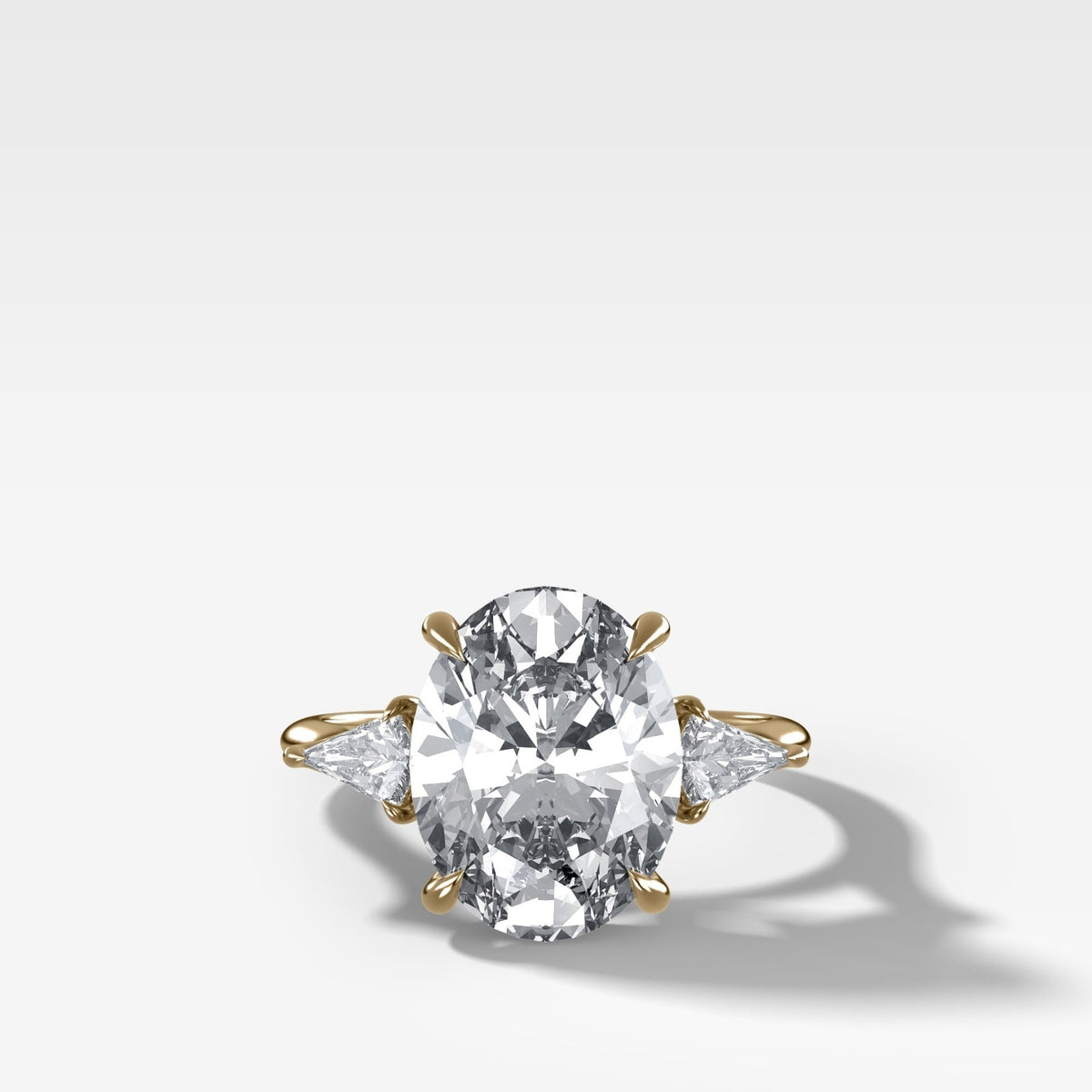 Three Stone Engagement Ring With Kite Side Stones and Oval Cut Diamond - GOODSTONE
