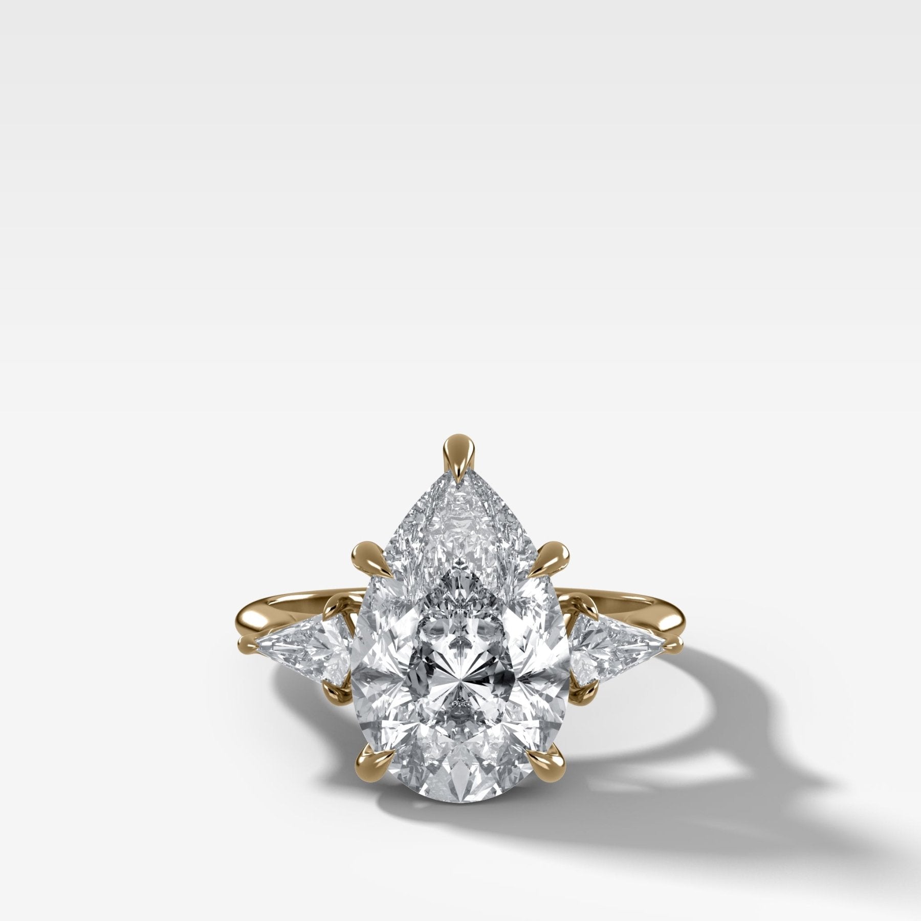Three Stone Engagement Ring With Kite Side Stones and Pear Cut Diamond - GOODSTONE