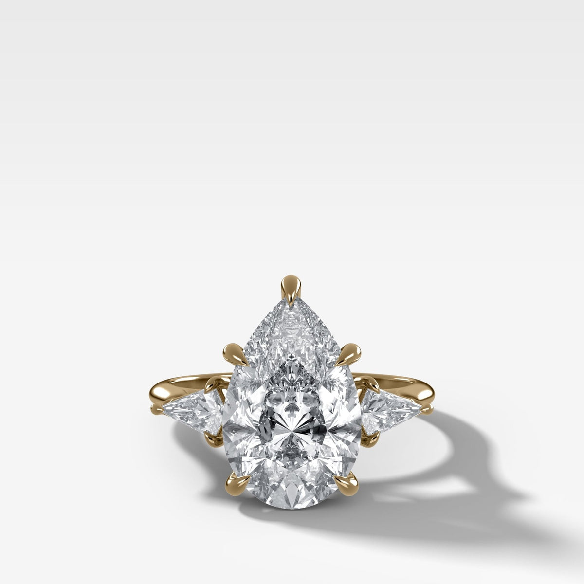 Three Stone Engagement Ring With Kite Side Stones and Pear Cut Diamond - GOODSTONE