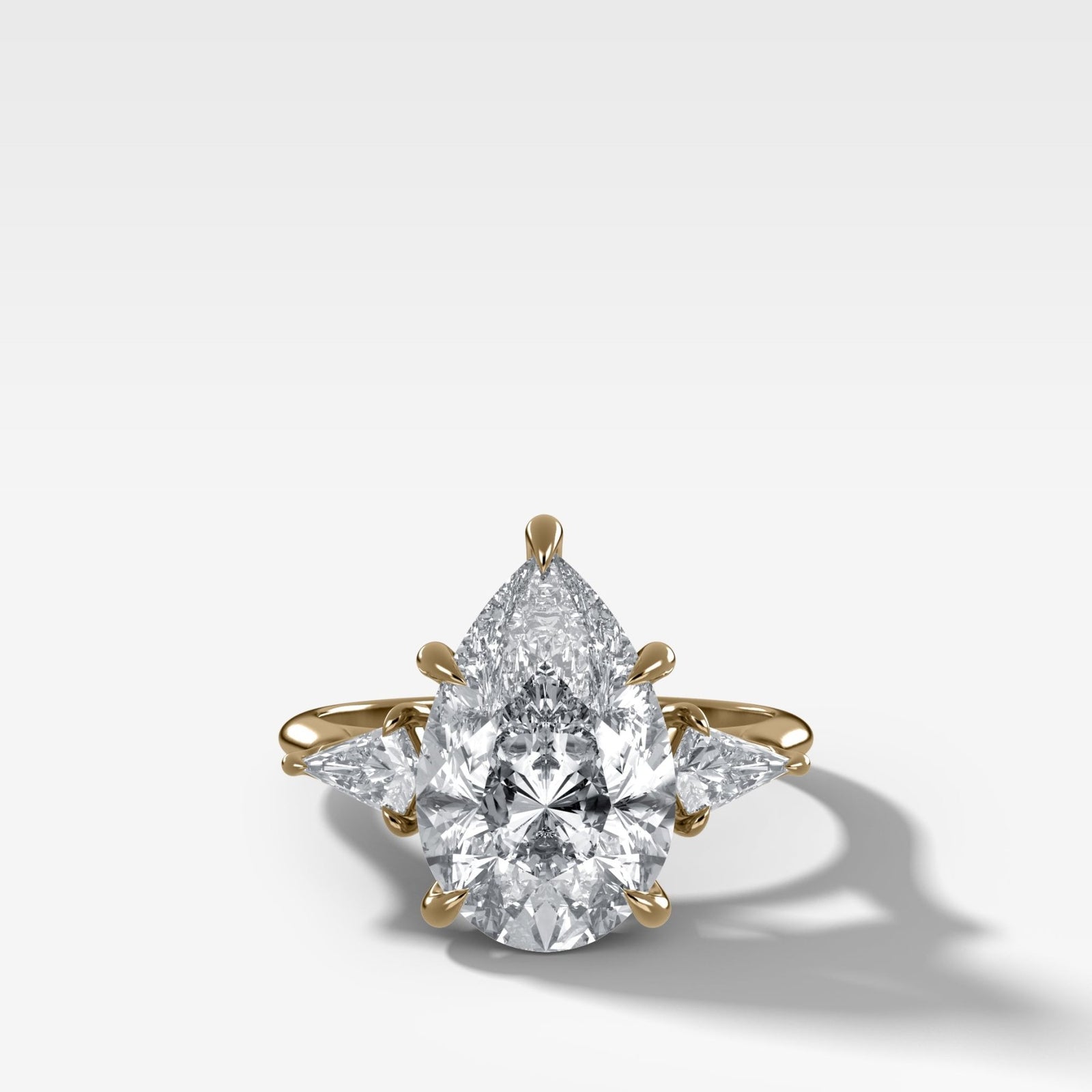Three Stone Engagement Ring With Kite Side Stones and Pear Cut Diamond - GOODSTONE