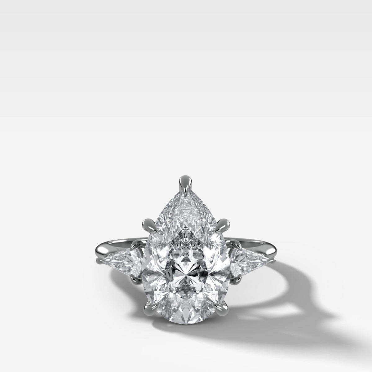 Three Stone Engagement Ring With Kite Side Stones and Pear Cut Diamond - GOODSTONE