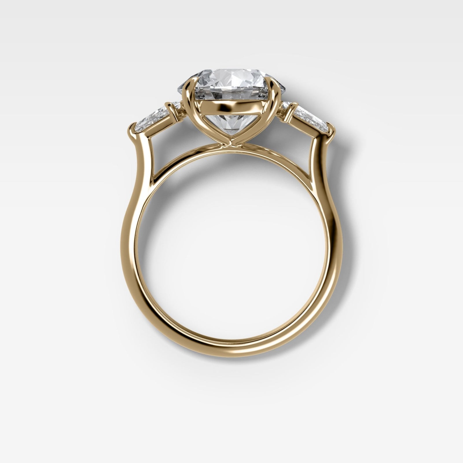 Three Stone Engagement Ring With Kite Side Stones and Round Cut Diamond - GOODSTONE