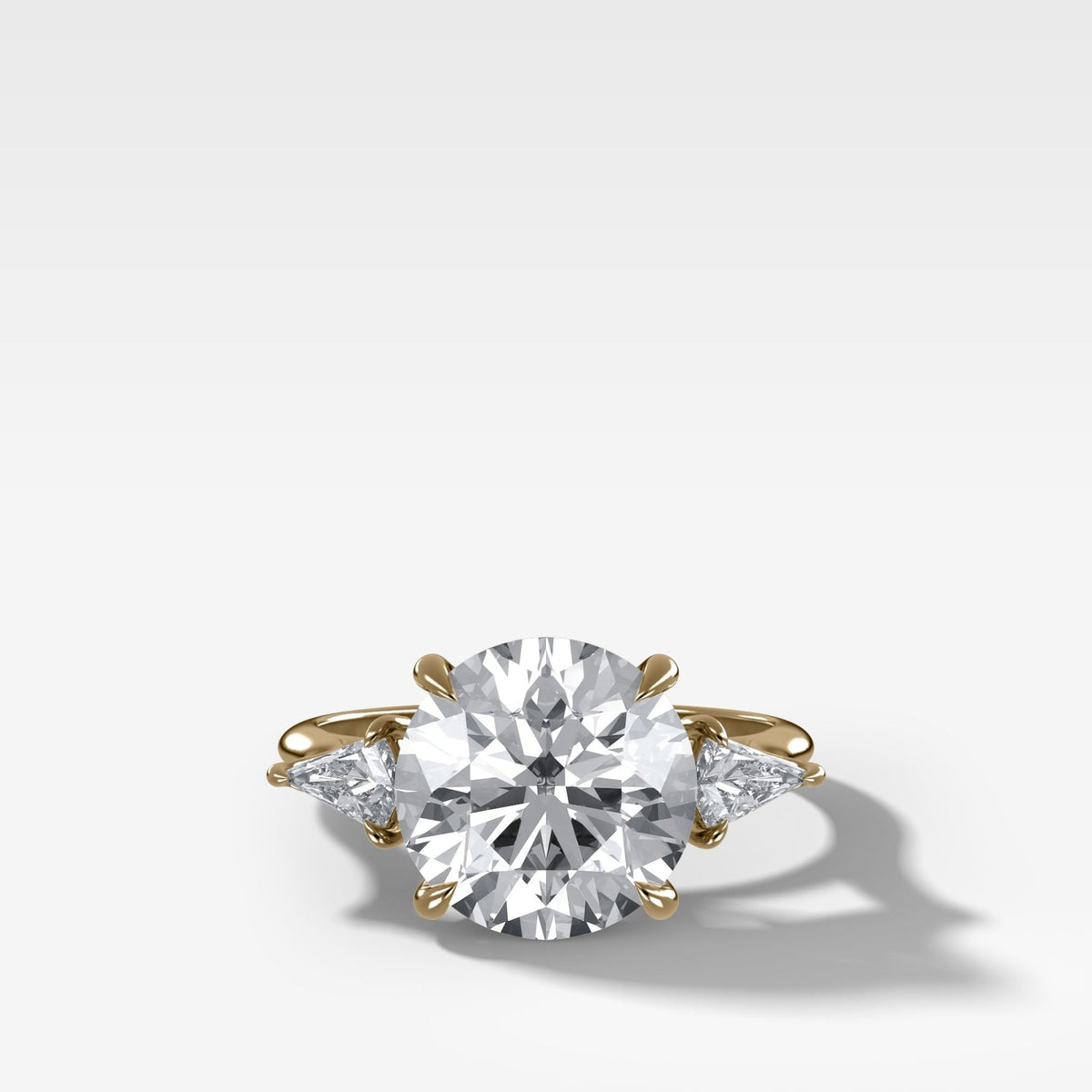 Three Stone Engagement Ring With Kite Side Stones and Round Cut Diamond - GOODSTONE