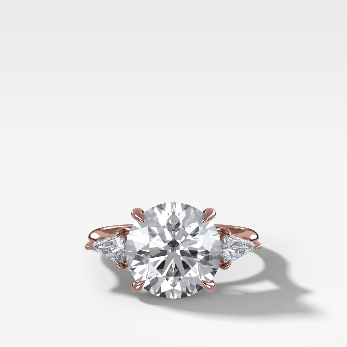 Three Stone Engagement Ring With Kite Side Stones and Round Cut Diamond - GOODSTONE