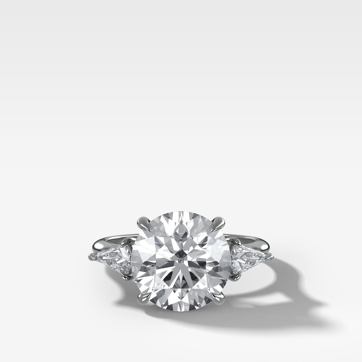 Three Stone Engagement Ring With Kite Side Stones and Round Cut Diamond - GOODSTONE