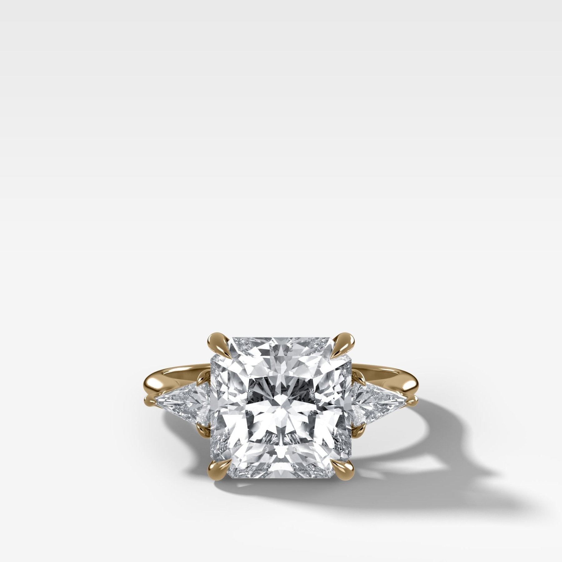 Three Stone Engagement Ring With Kite Side Stones and Square Radiant Cut Diamond - GOODSTONE