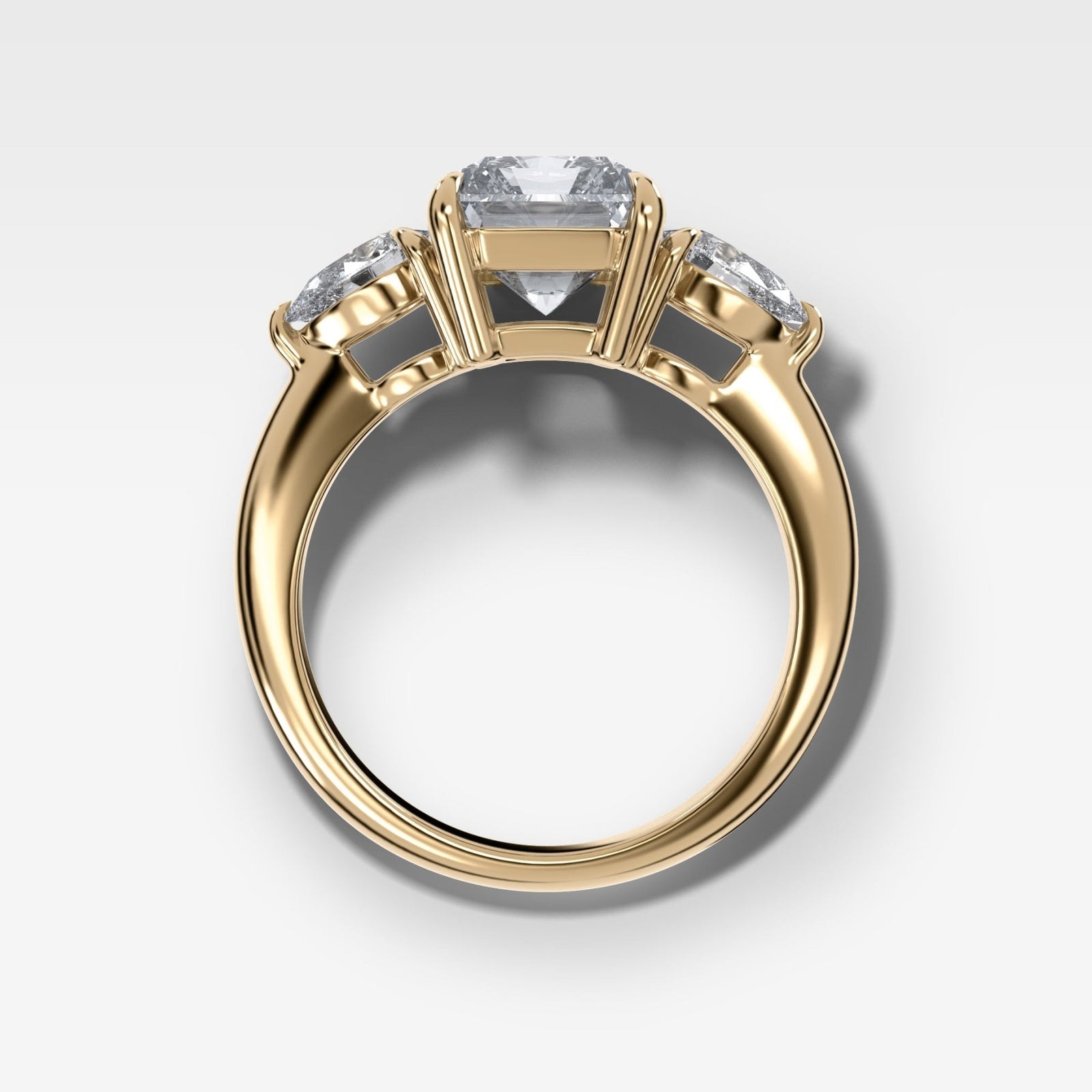 Three Stone Engagement Ring With Pear Side Stones and Elongated Radiant Cut Diamond - GOODSTONE