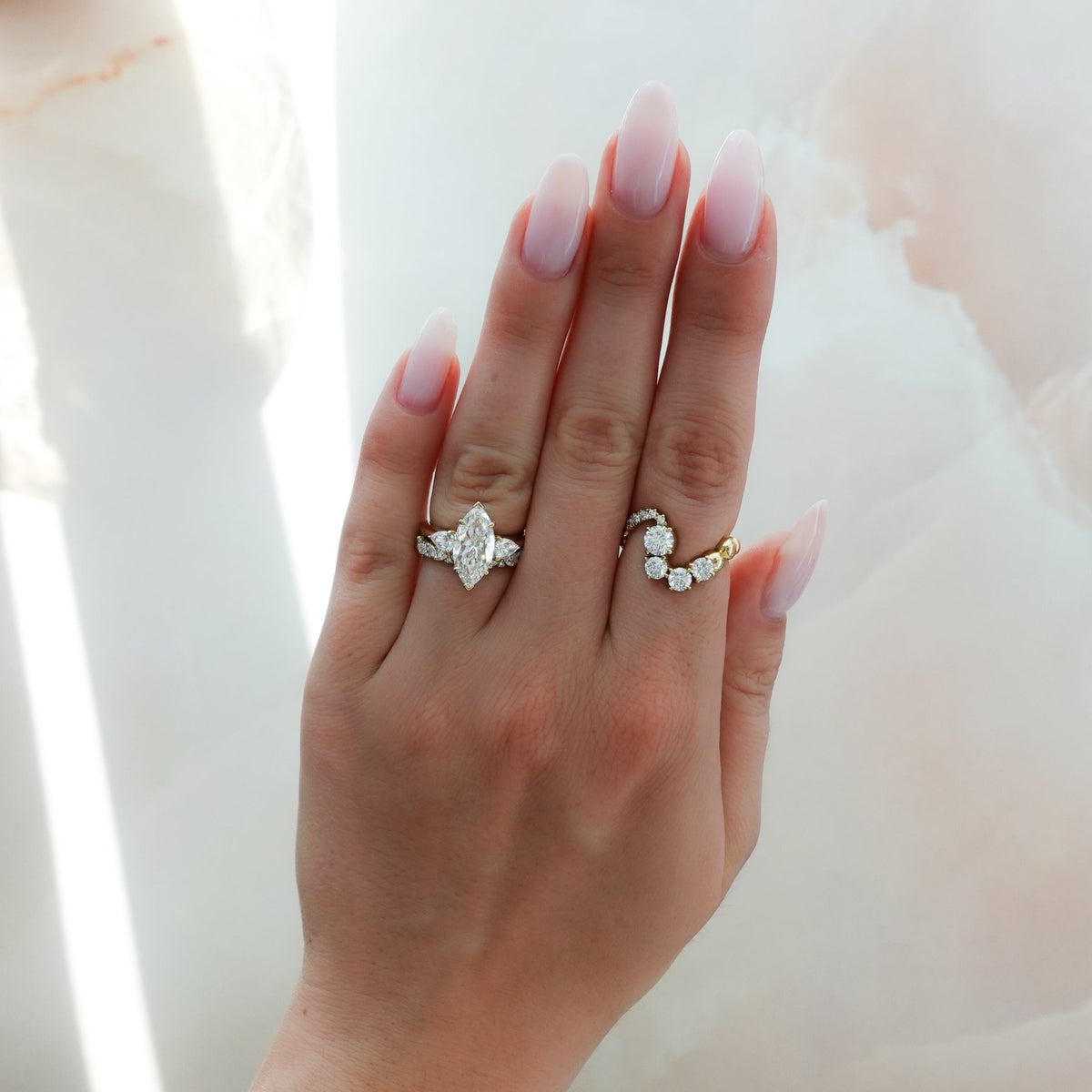 Three Stone Engagement Ring With Pear Side Stones and Marquise Cut Diamond - GOODSTONE