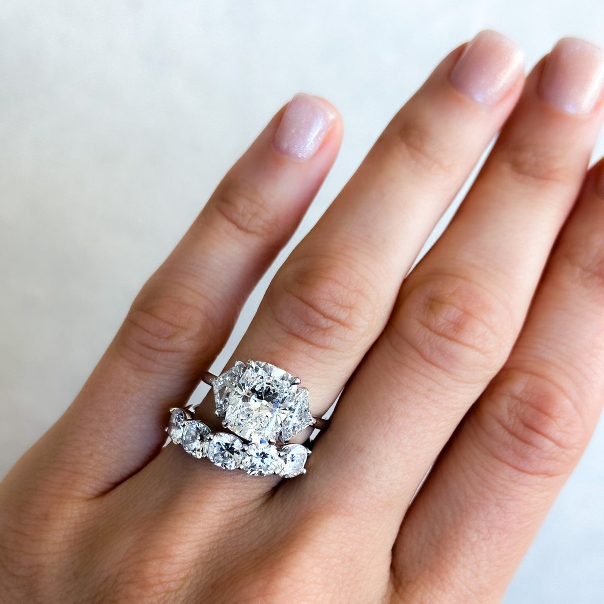 Three Stone Engagement Ring with Shield Side Stones and an Elongated Cushion cut Diamond - GOODSTONE