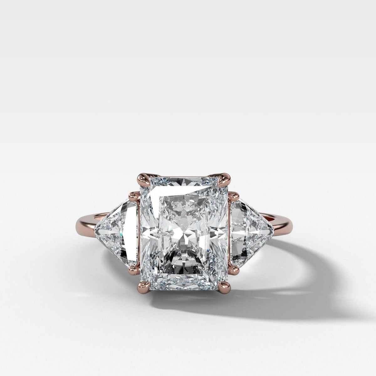 Three Stone Engagement Ring with Shield Side Stones and an Elongated Radiant cut Diamond - GOODSTONE