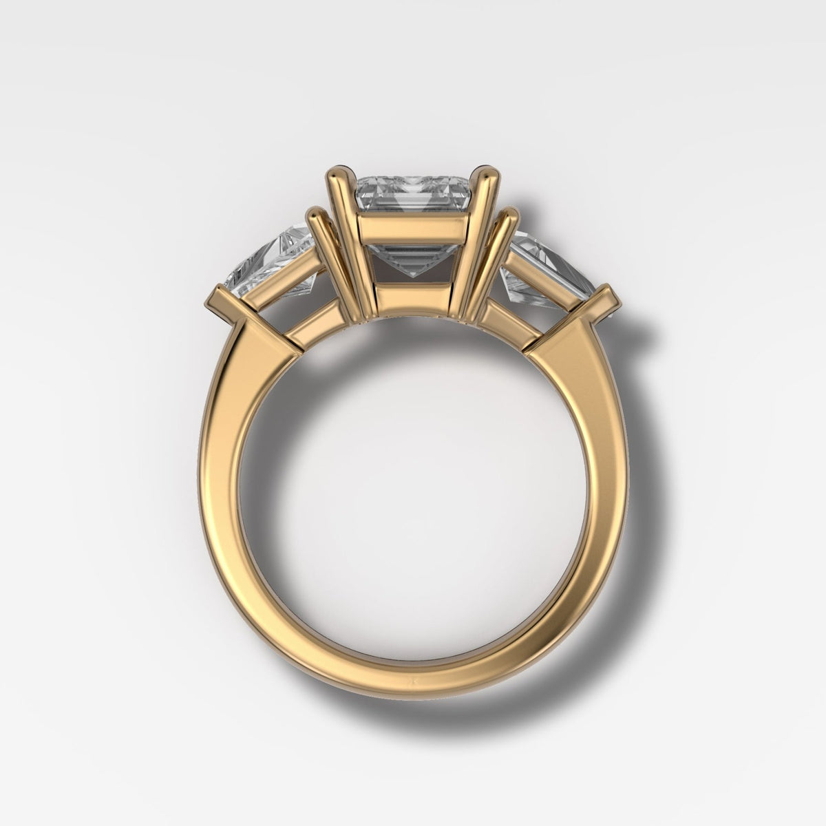 Three Stone Engagement Ring with Shield Side Stones and an Emerald Cut Diamond - GOODSTONE