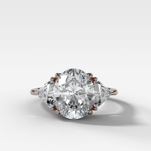 Three Stone ring with Shield Side Stones and an Oval cut | GOODSTONE