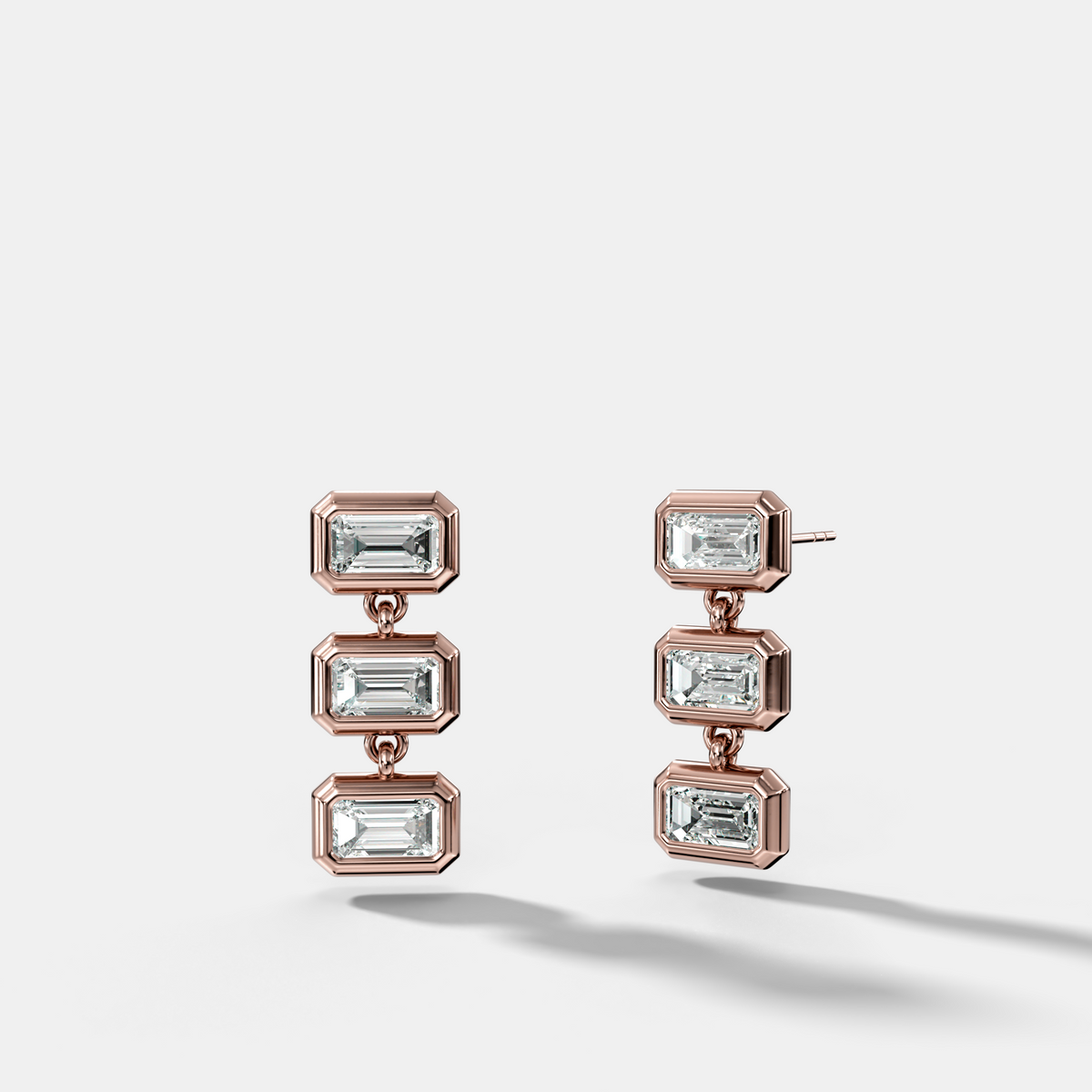 Three Stone Bezel Drop Earrings with East West Emerald Cut Diamonds