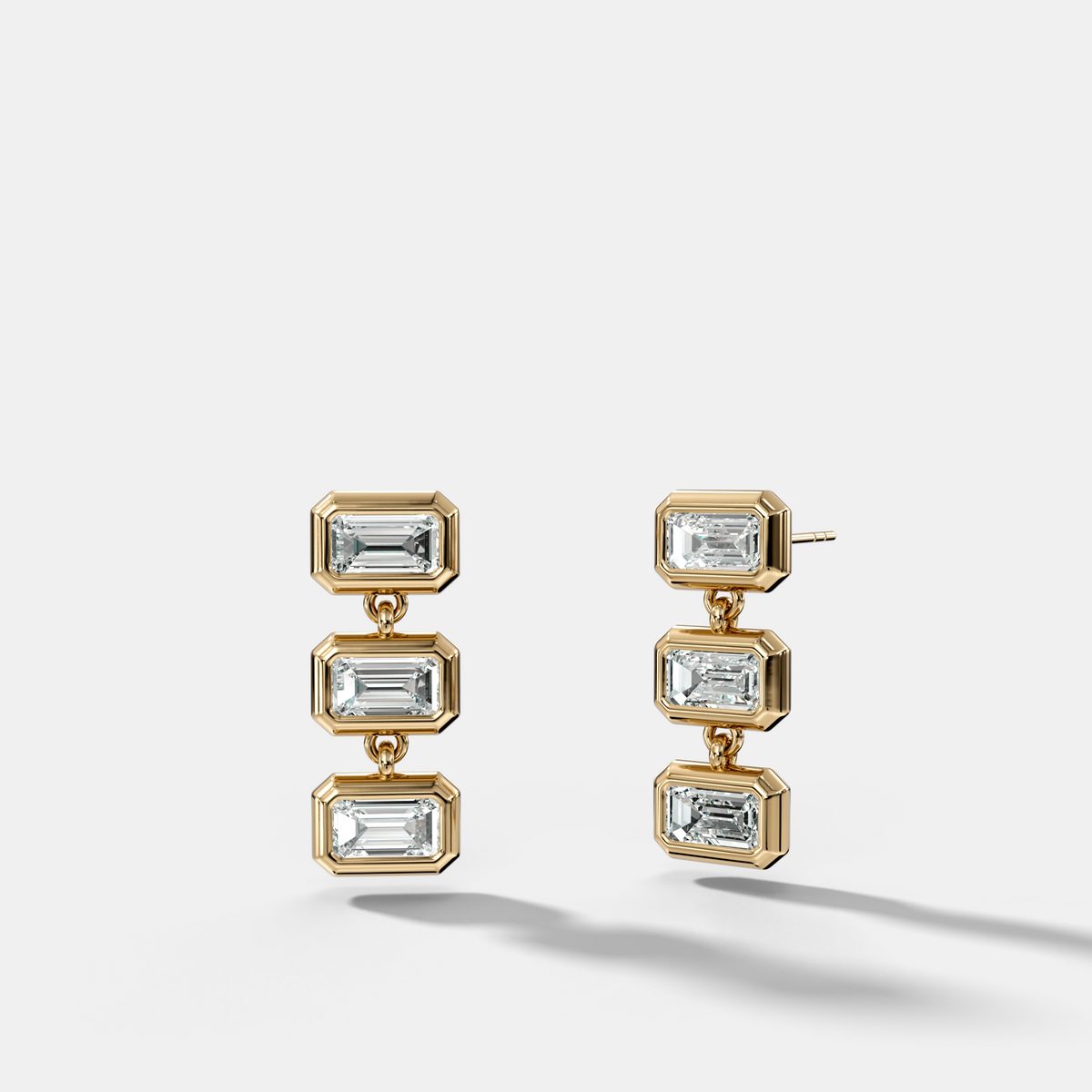 Three Stone Bezel Drop Earrings with East West Emerald Cut Diamonds