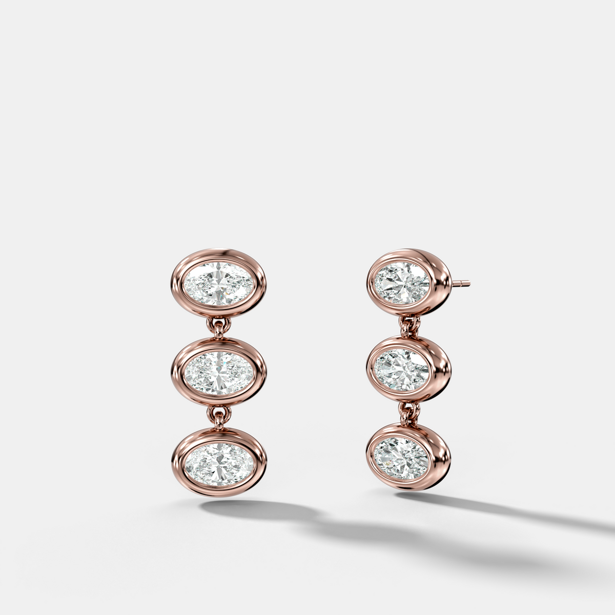 Three Stone Bezel Drop Earrings with East West Oval Cut Diamonds