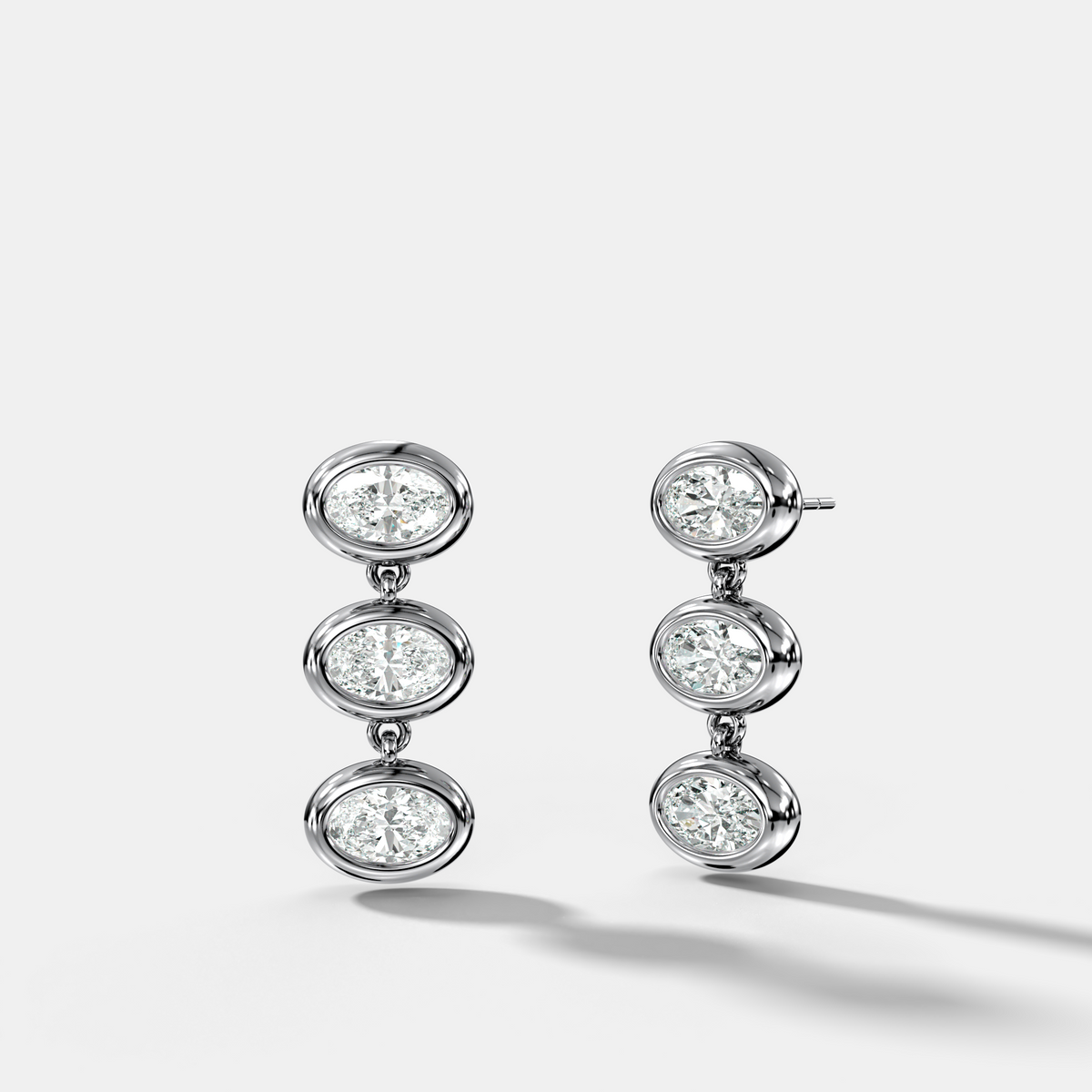 Three Stone Bezel Drop Earrings with East West Oval Cut Diamonds