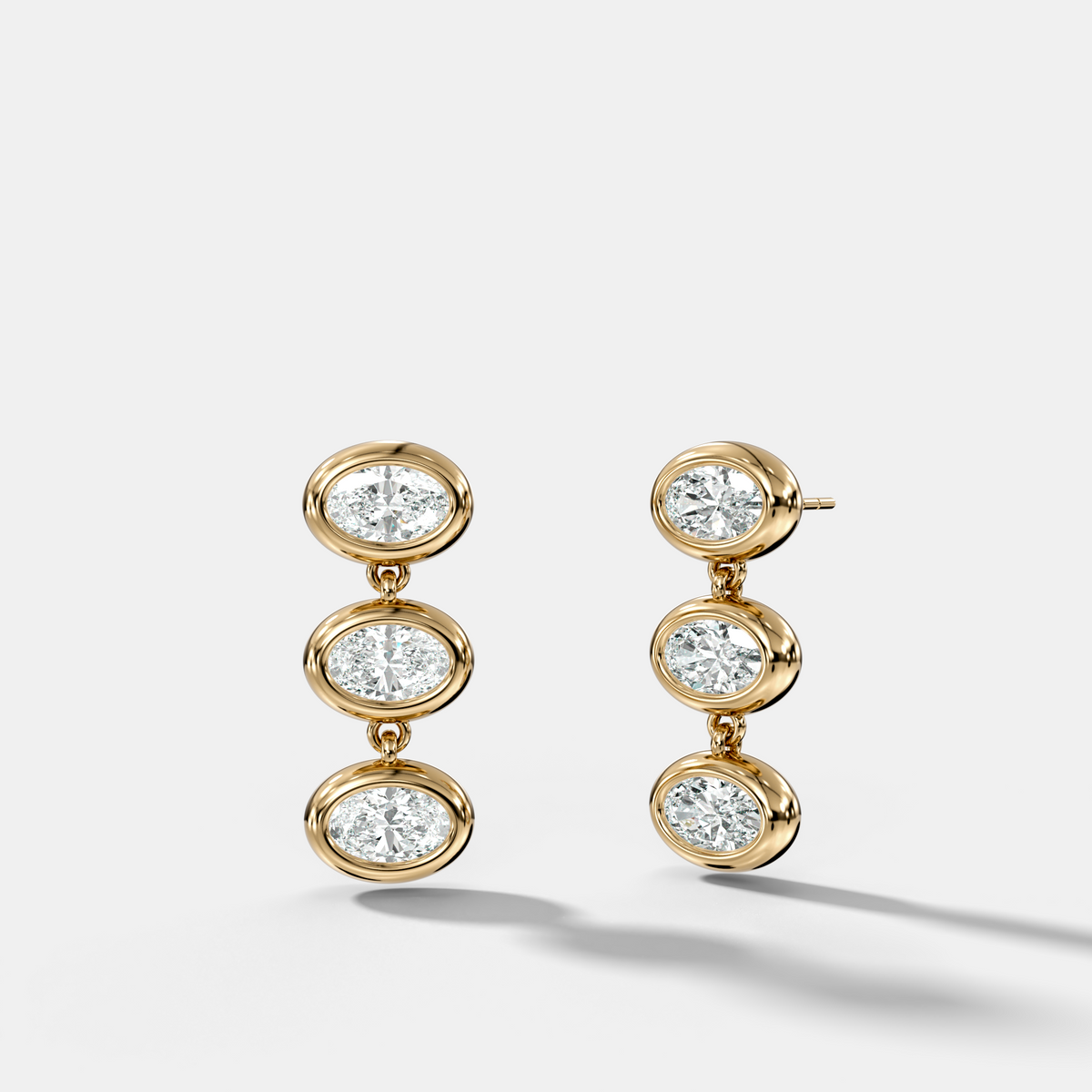 Three Stone Bezel Drop Earrings with East West Oval Cut Diamonds
