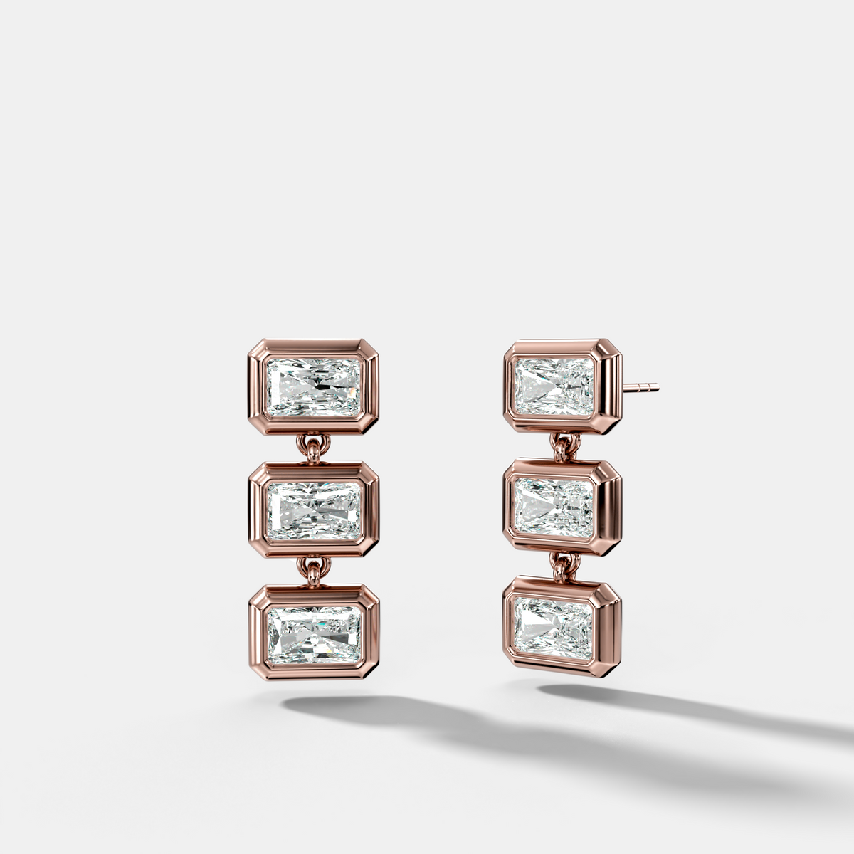 Three Stone Bezel Drop Earrings with East West Elongated Radiant Cut Diamonds