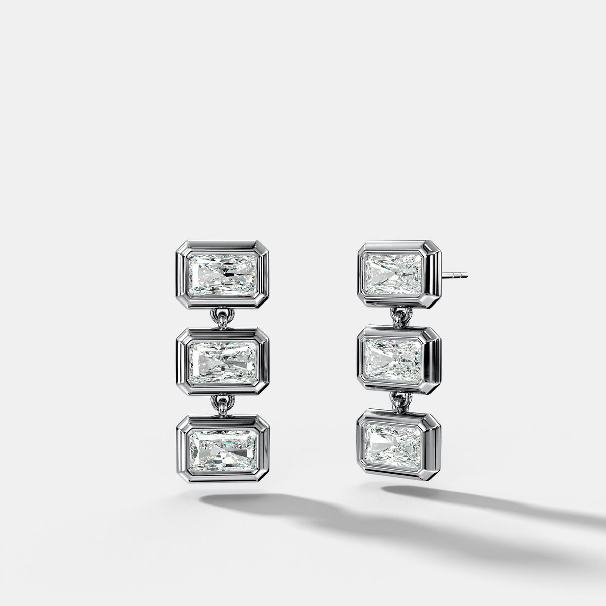 Three Stone Bezel Drop Earrings with East West Elongated Radiant Cut Diamonds