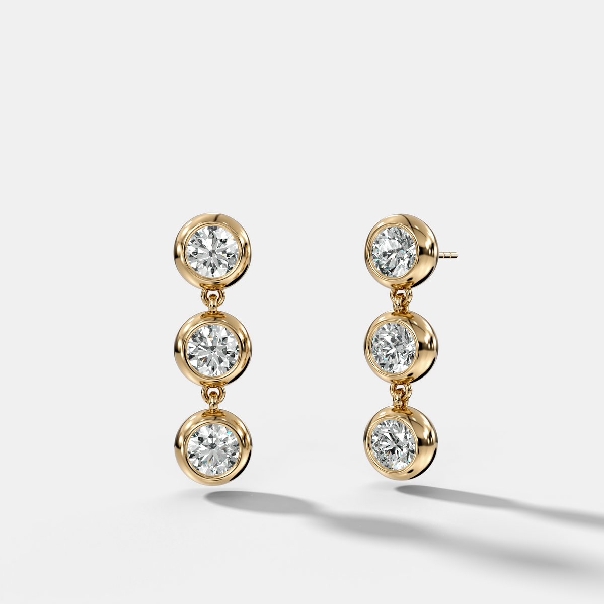 Three Stone Bezel Drop Earrings with Round Cut Diamonds