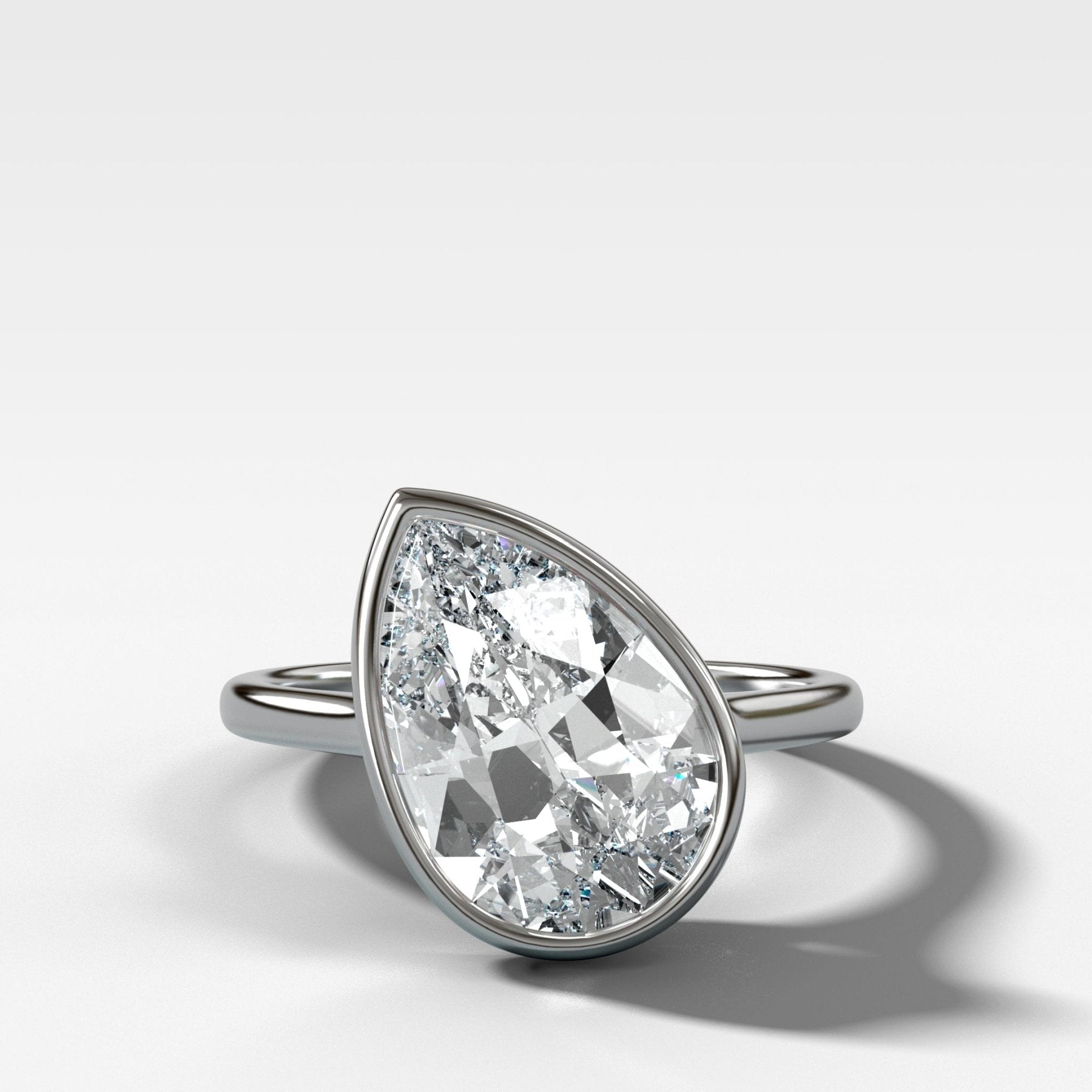 Tilted Penumbra Bezel Set Engagement Ring with 4.43ct Lab Grown Pear Cut Diamond - GOODSTONE
