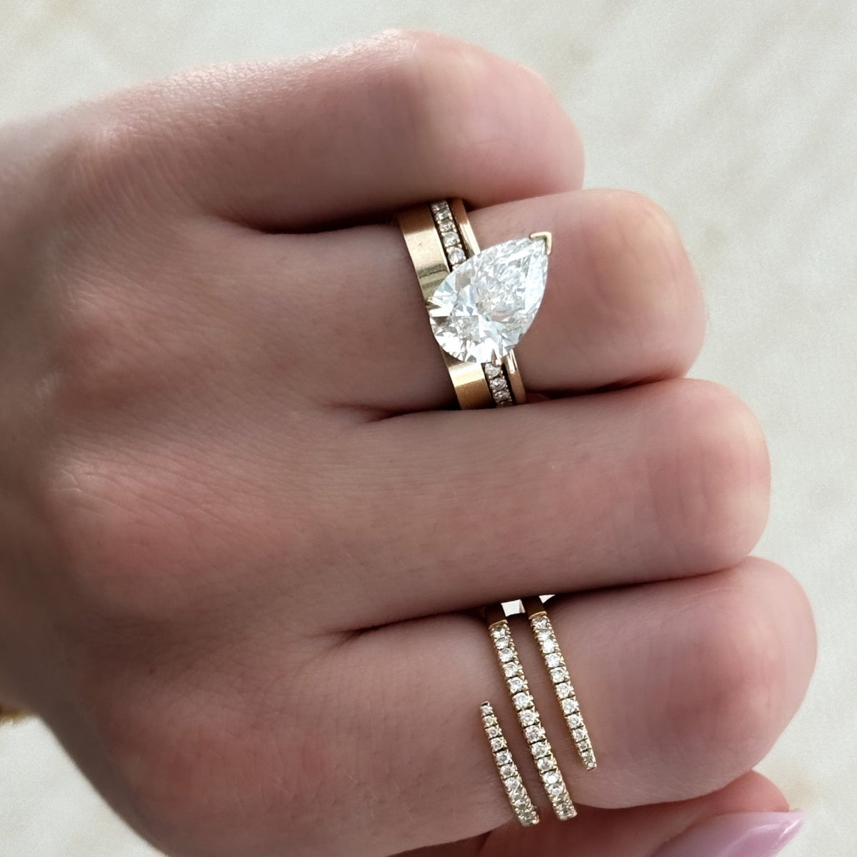 Tilted Thin + Simple Solitaire Engagement Ring With Pear Cut Diamond - GOODSTONE