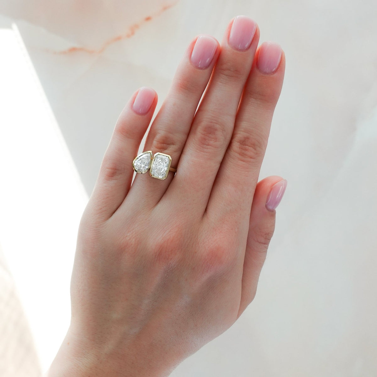 Toi et Moi Bezel Engagement Ring with Pear and Elongated Radiant Cut Diamonds - GOODSTONE