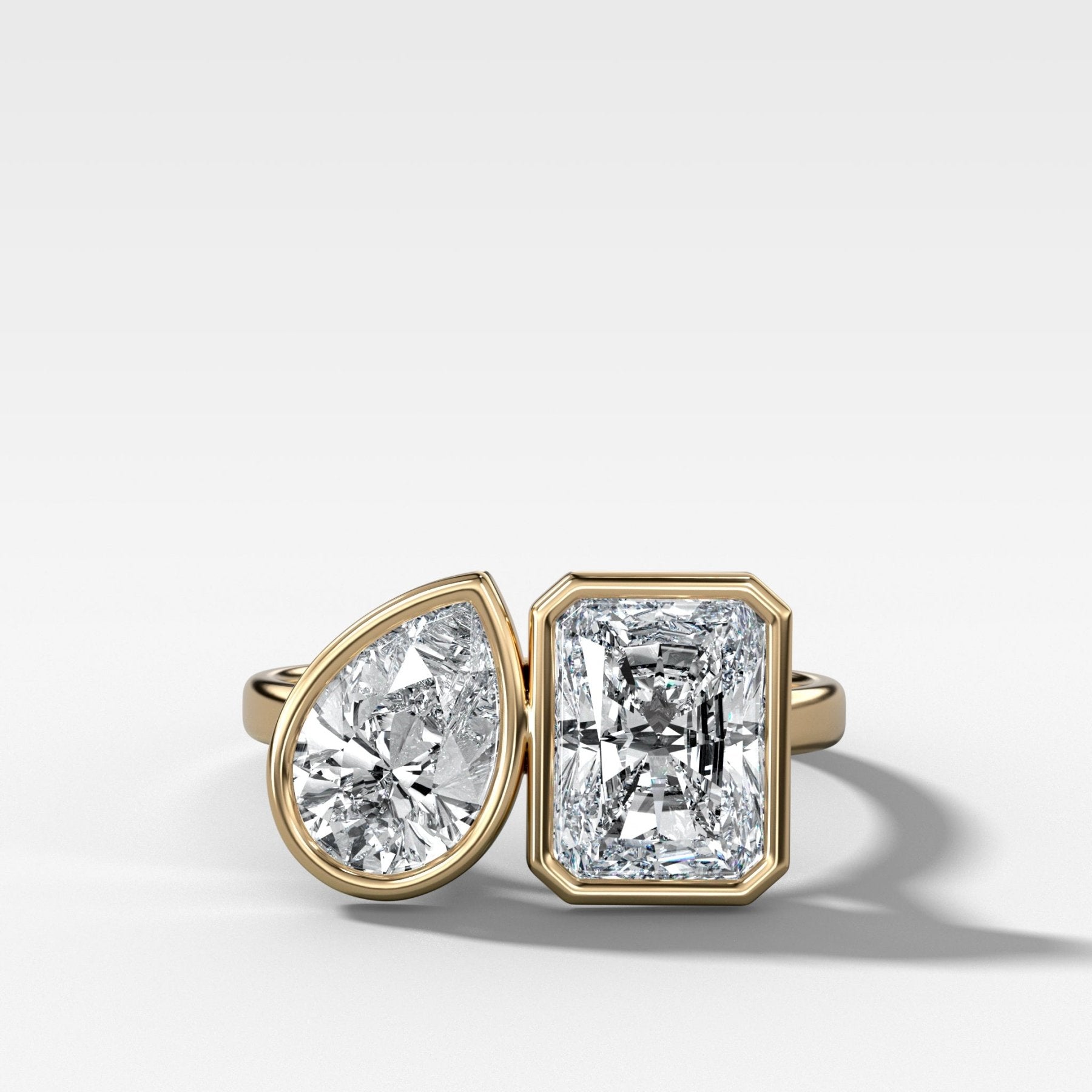 Toi et Moi Bezel Engagement Ring with Pear and Elongated Radiant Cut Diamonds - GOODSTONE
