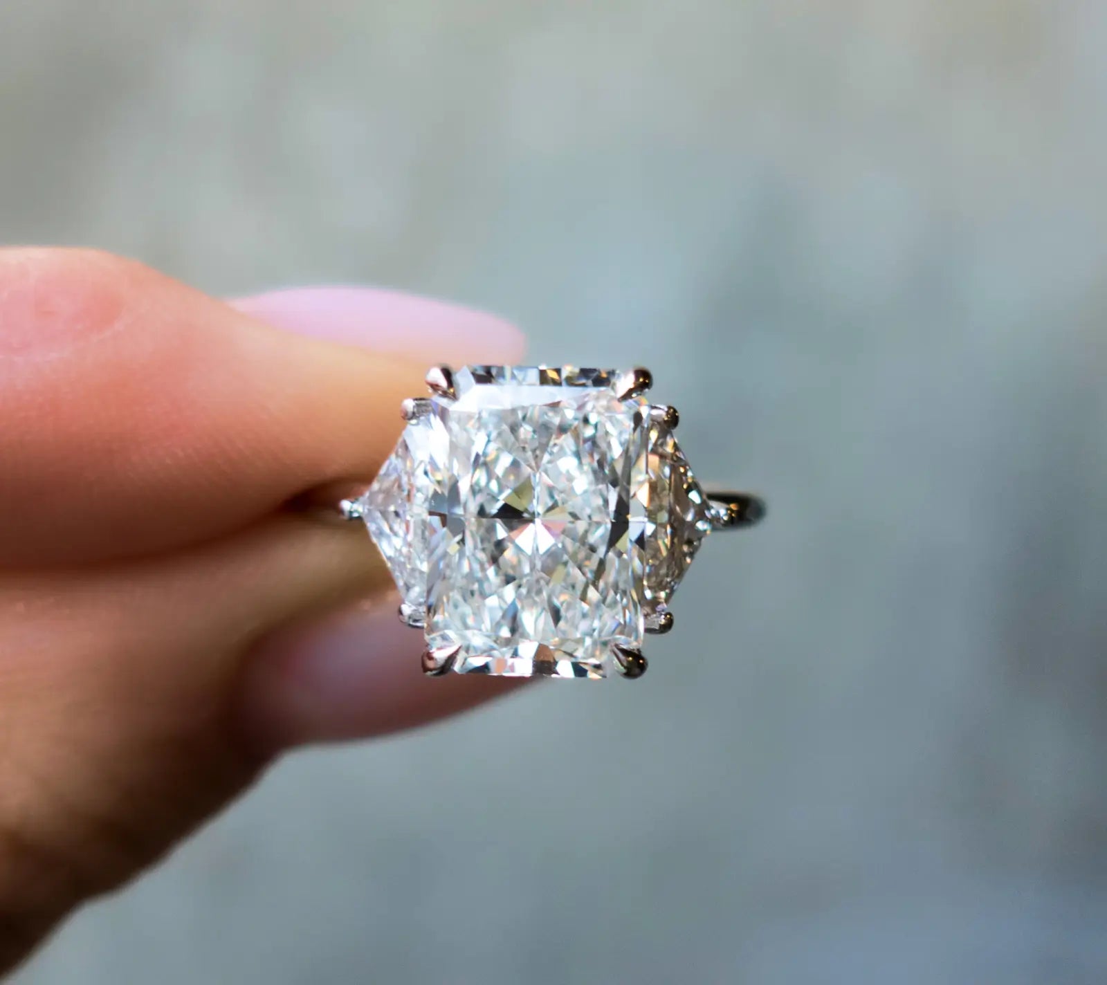 Crescent Solitaire Engagement Ring With Pear Cut Diamond