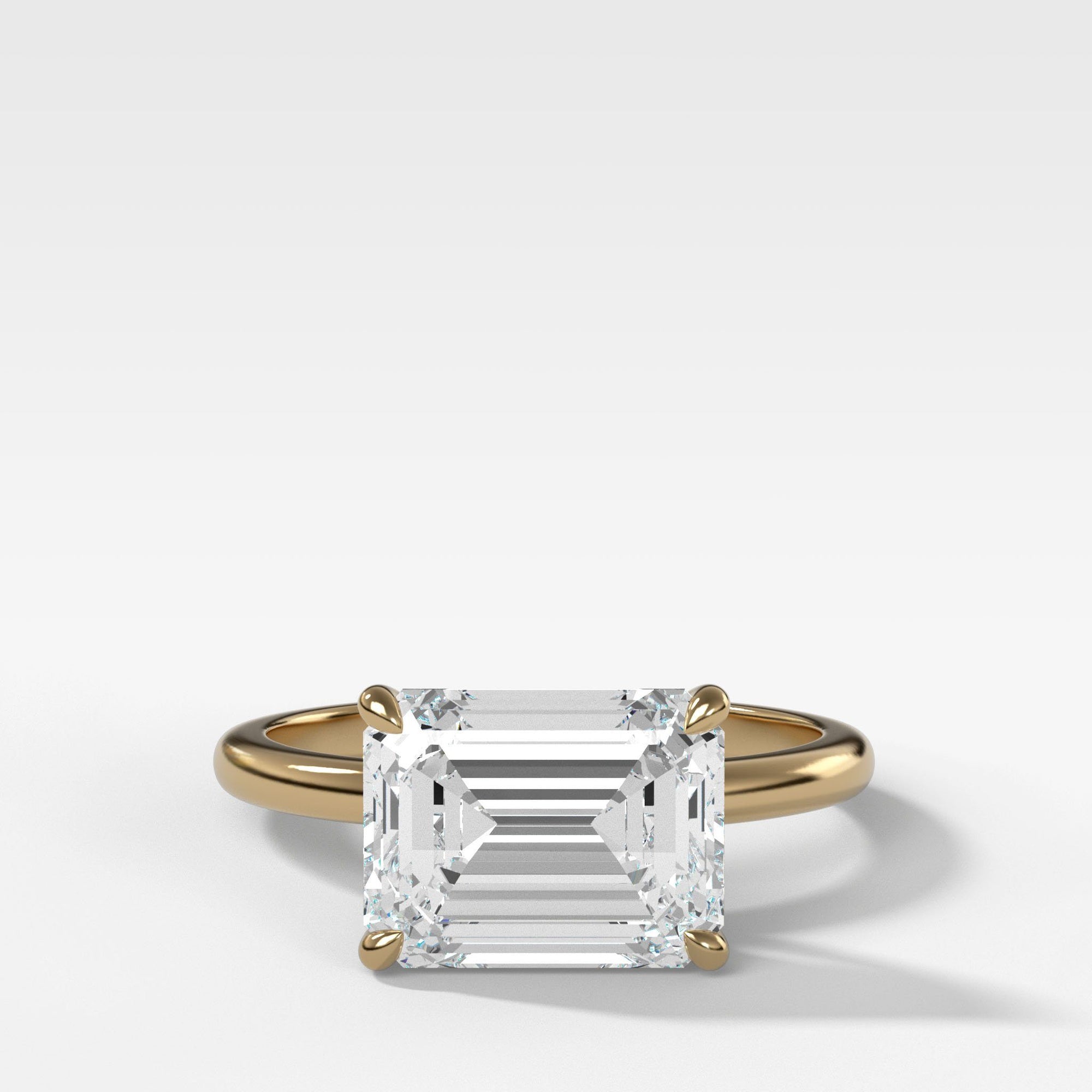 Crescent Solitaire With Emerald Cut (East West) by Good Stone in Yellow Gold