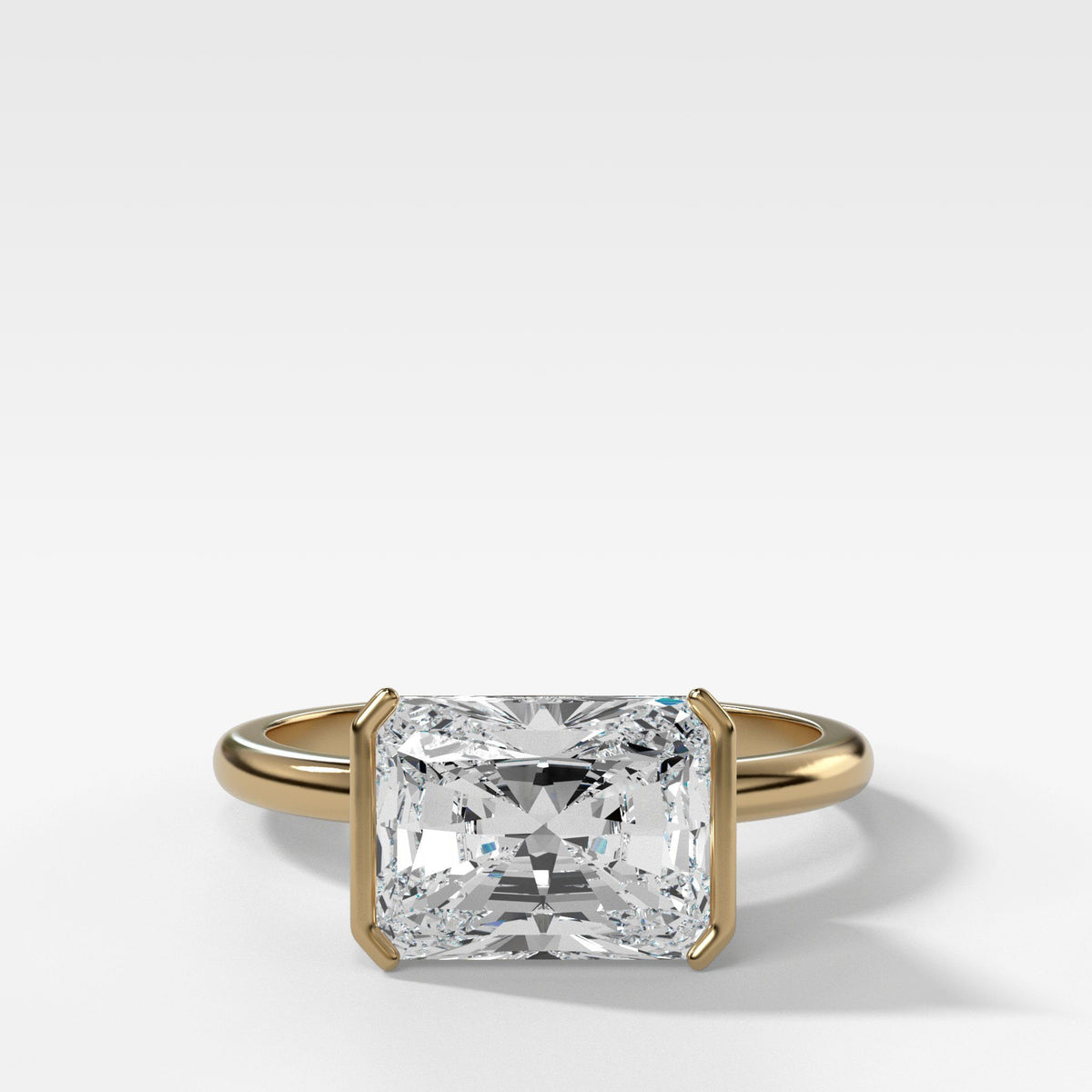Half Bezel Solitaire Engagement ring with Elongated Radiant Cut by Good Stone in Yellow Gold