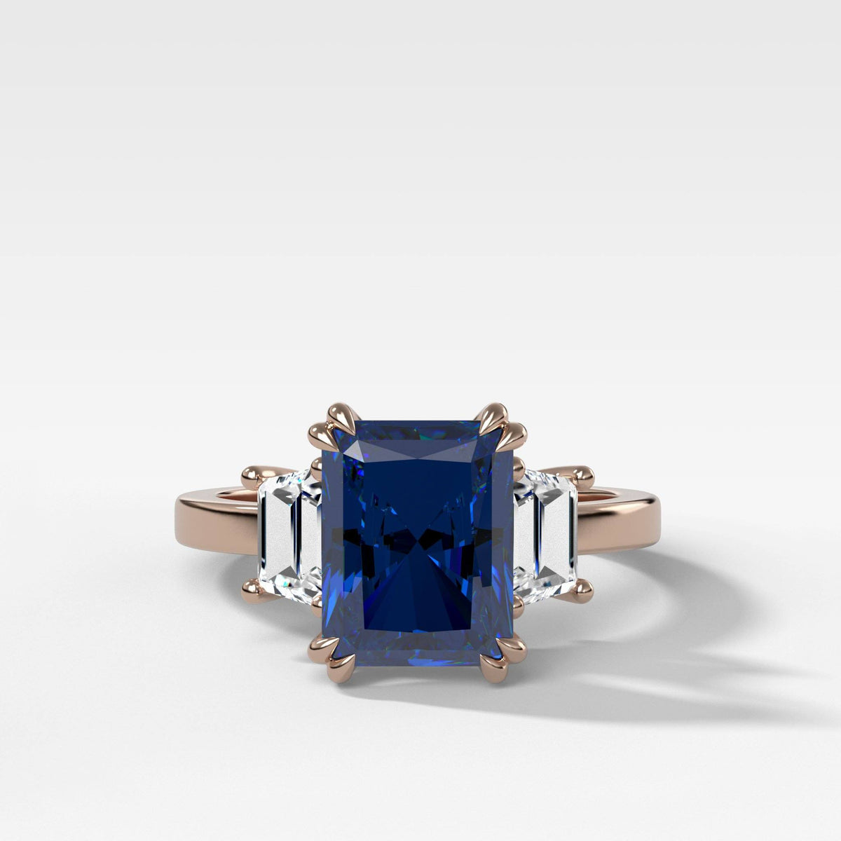 Sapphire Radiant Cut With Trapezoid Side Stone Engagement Ring by Good Stone in Rose Gold