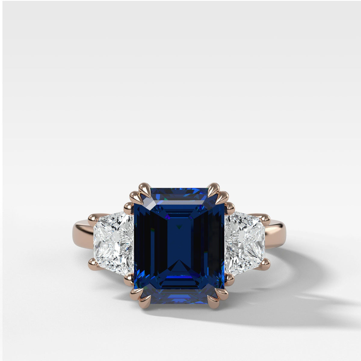 Sapphire Emerald Cut With Trapezoid Side Stone Engagement Ring by Good Stone in Rose Gold