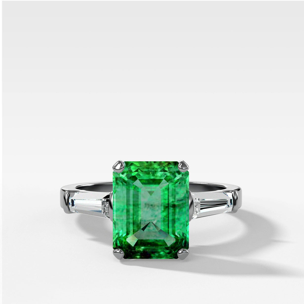 Emerald cut Emerald Translunar Ring with Tapered Baguette Diamond sides by Good Stone in White Gold