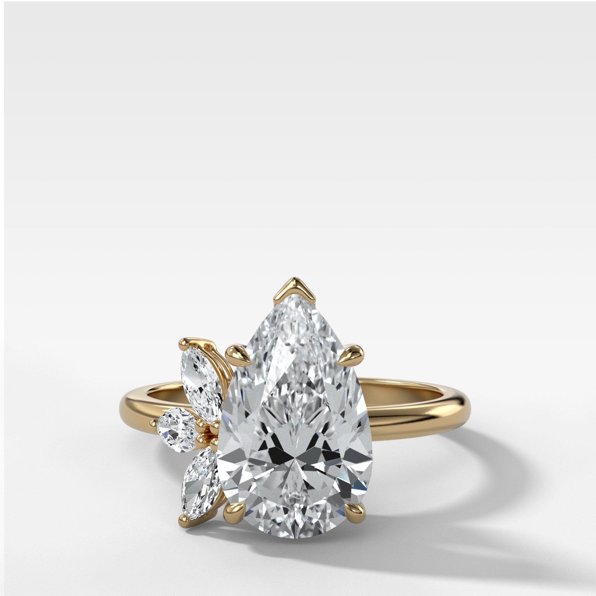 Lotus Engagement Ring With Pear Cut by Good Stone in Yellow Gold