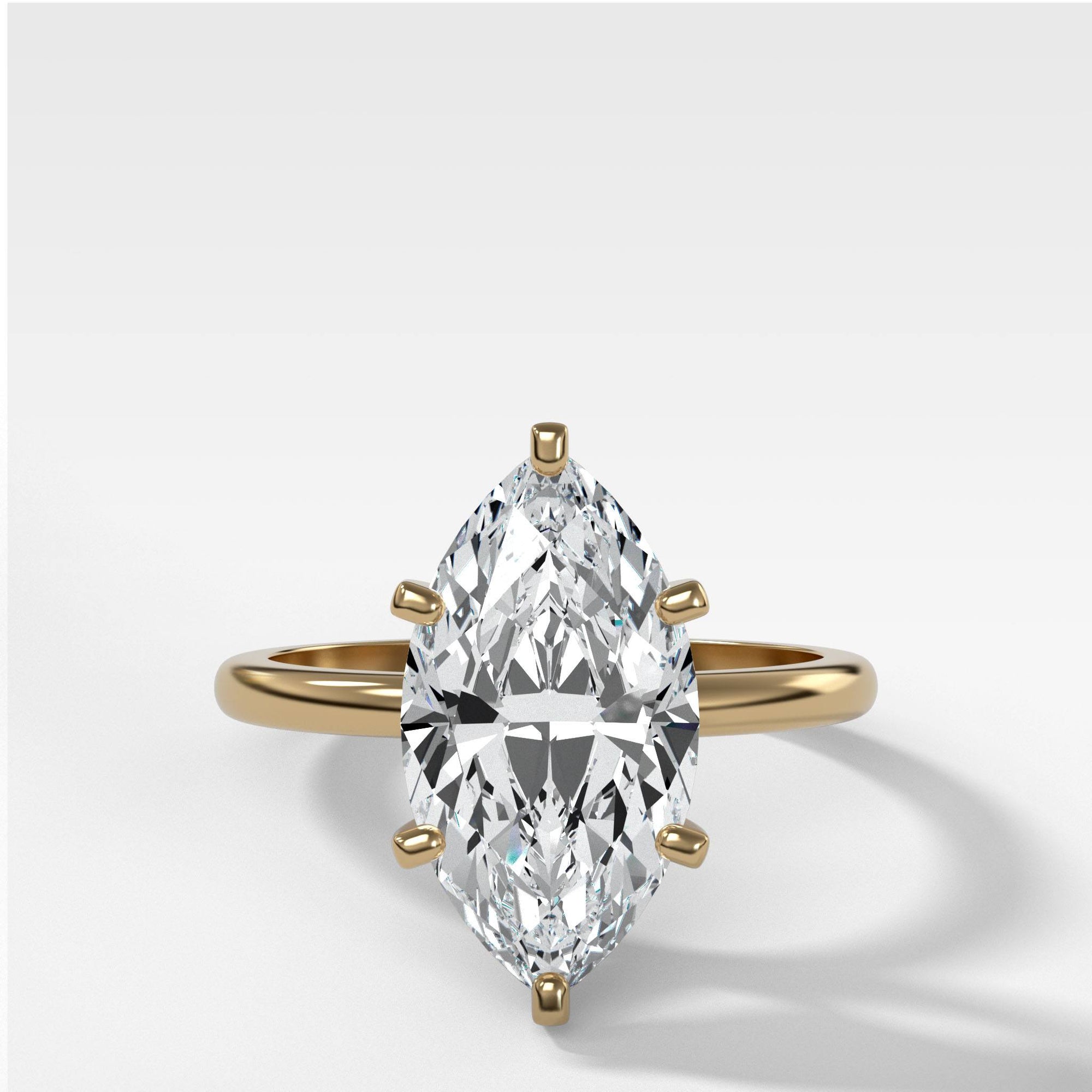 Nova Solitaire With Marquise Cut by Good Stone in Yellow Gold