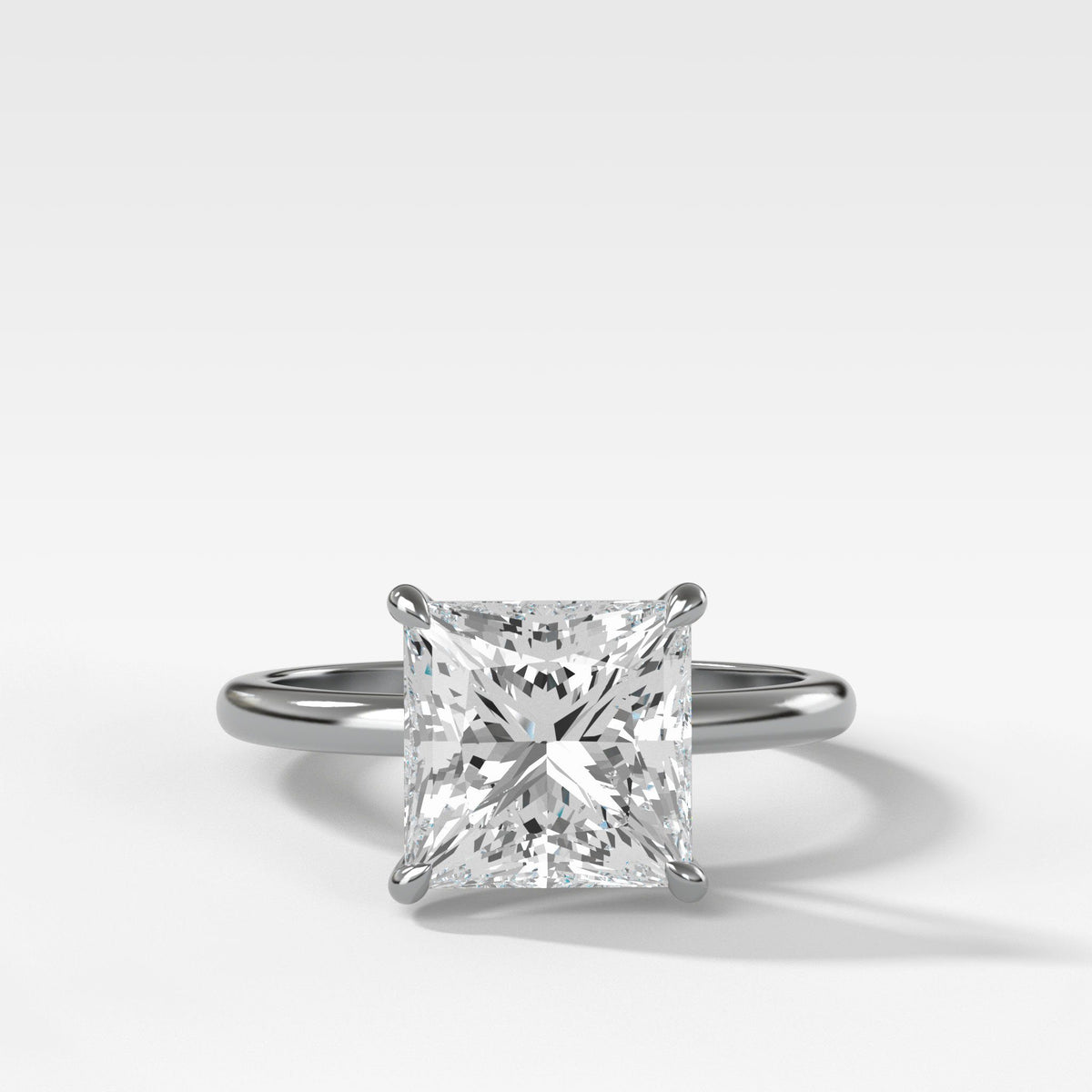 Crescent Solitaire Engagement Ring With Princess Cut Diamond