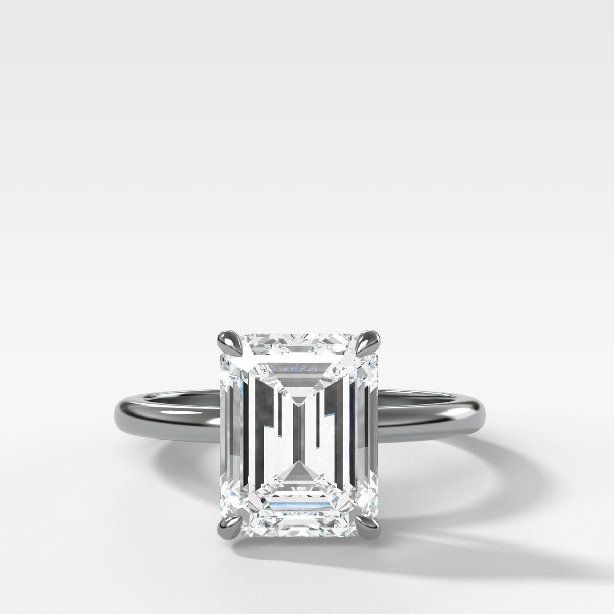 Crescent Solitaire With Emerald Cut (North South) by Good Stone in White Gold
