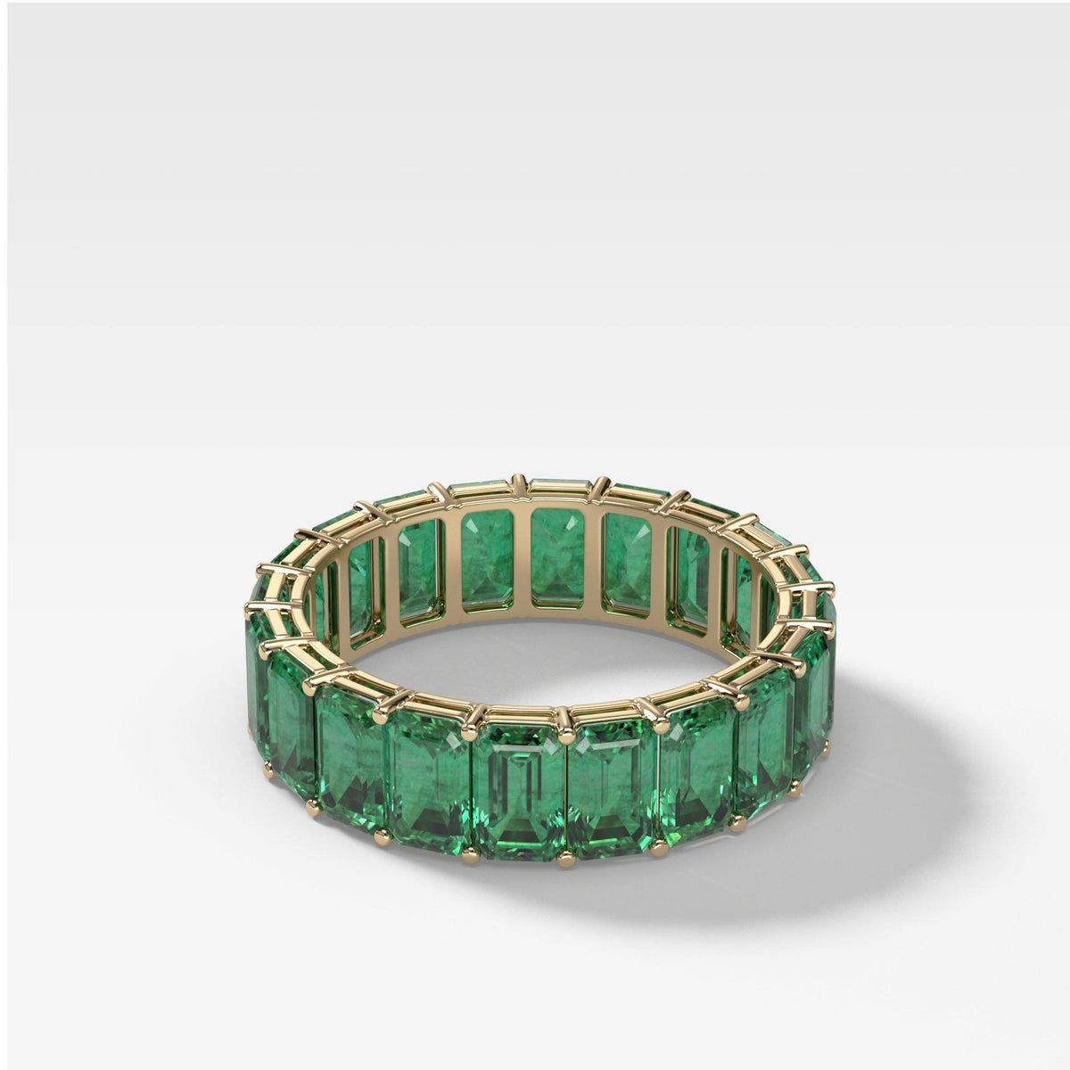 Green Emerald Emerald Cut Eternity band by Good Stone in Yellow Gold