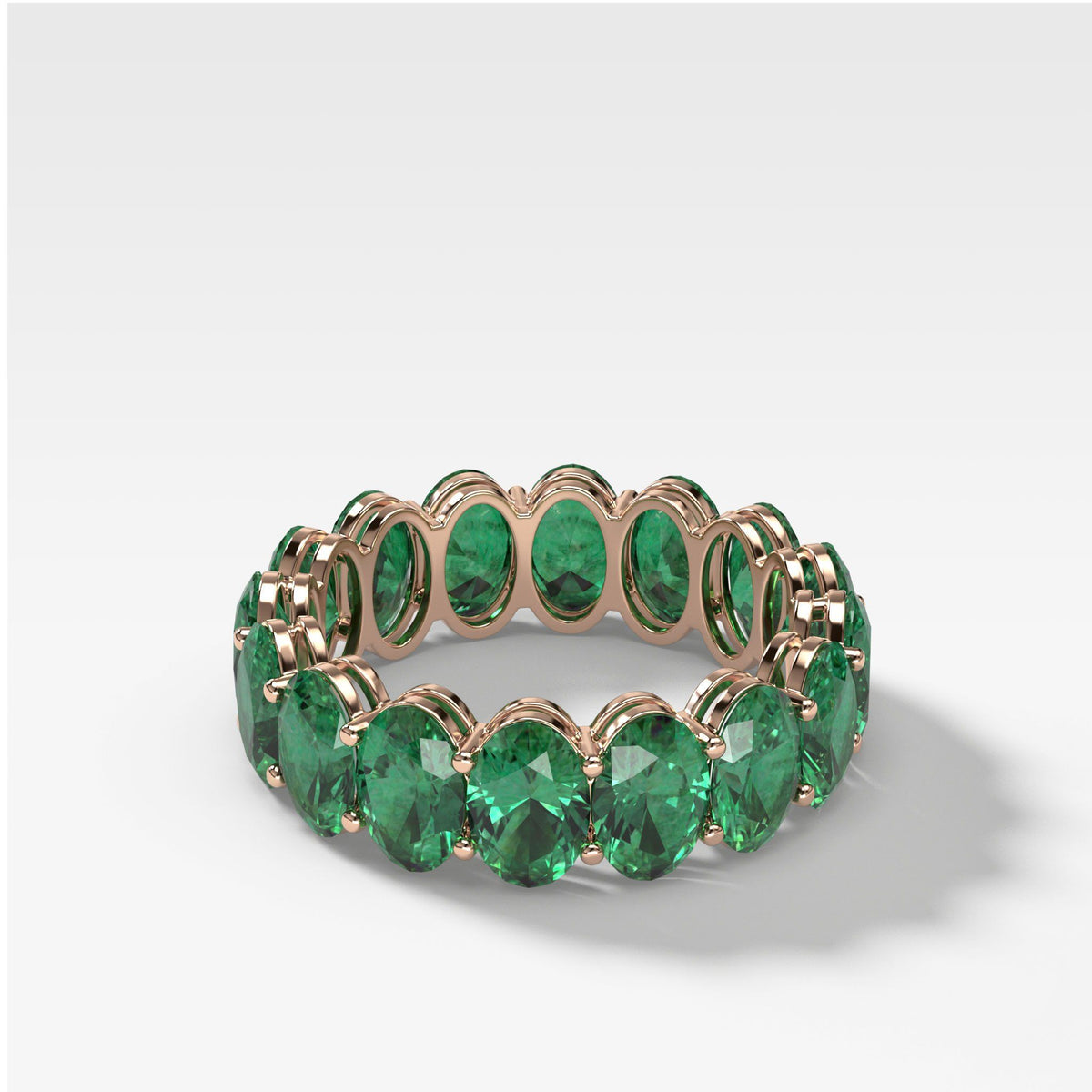 Green Emerald Oval Eternity Band by Good Stone in Rose Gold