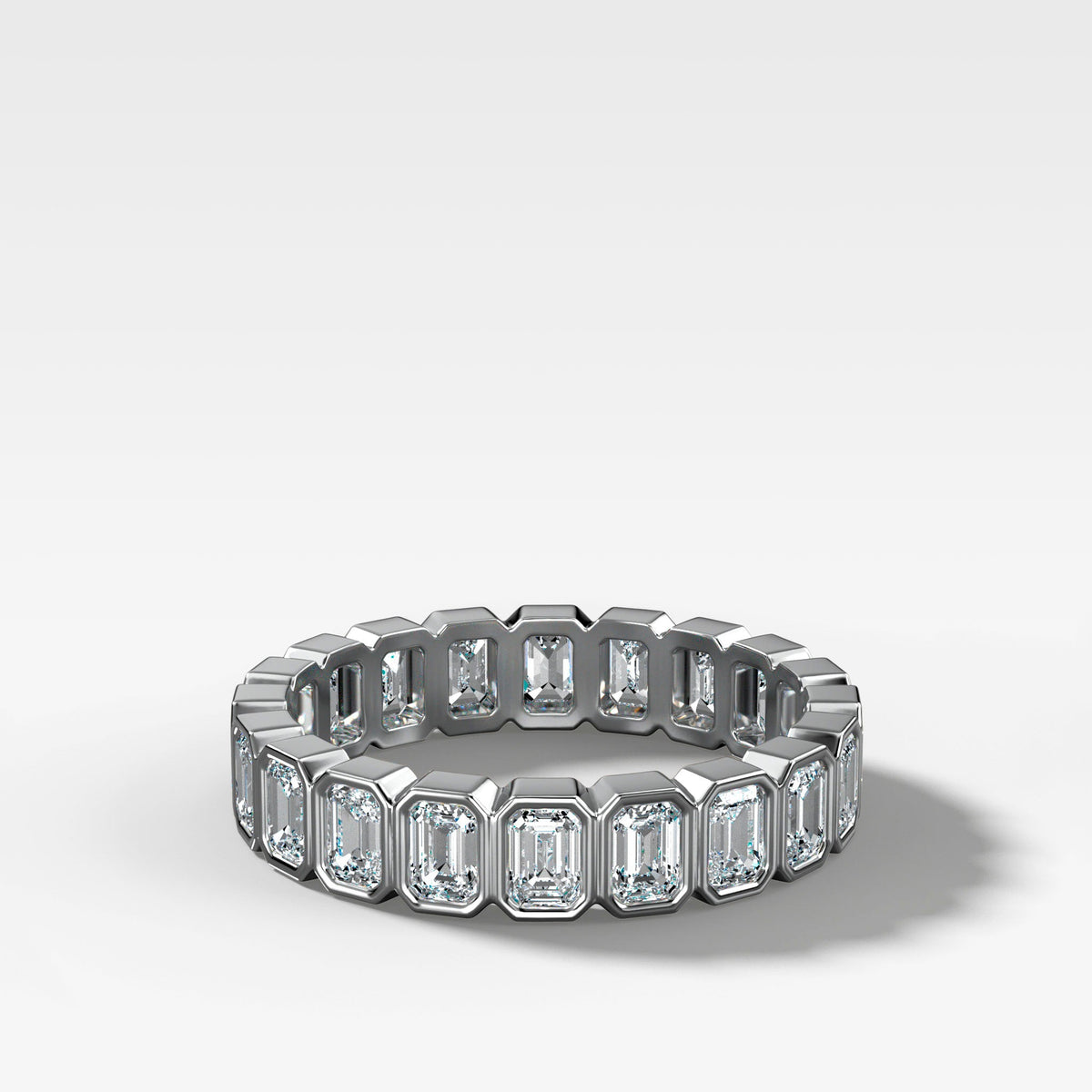 Baby Bezel Set Eternity Band With Emerald Cuts in White Gold by Good Stone