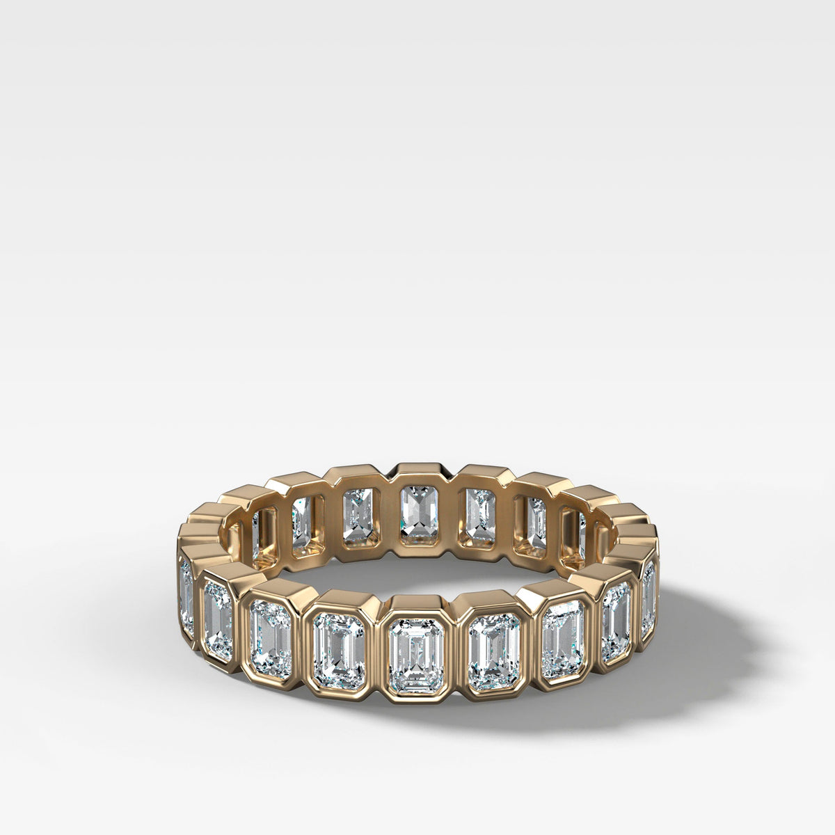 Baby Bezel Set Eternity Band With Emerald Cuts in Yellow Gold by Good Stone