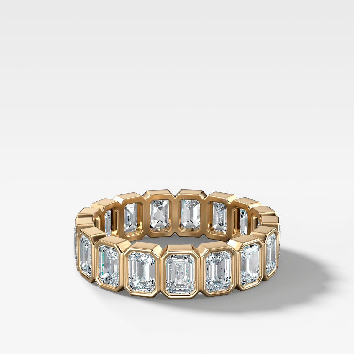 Midi Bezel Set Eternity Band With Emerald Cuts in Yellow Gold by Good Stone