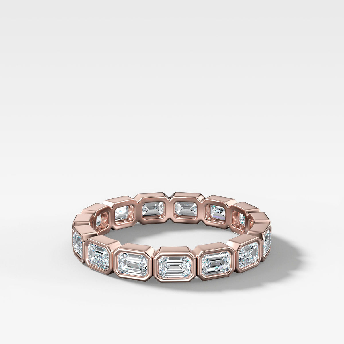 Baby Bezel Set Eternity Band With East West Emerald Cuts in Rose Gold by Good Stone