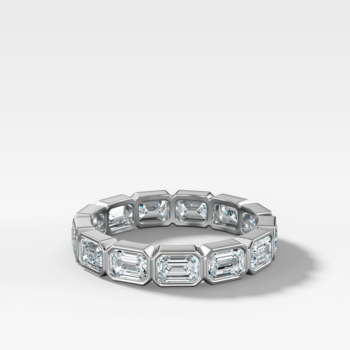Midi Bezel Set Eternity Band With East West Emerald Cuts in White Gold by Good Stone