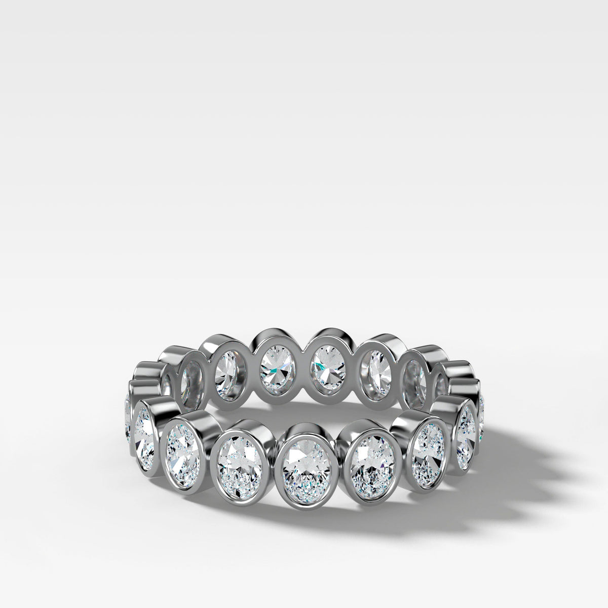 Baby Bezel Set Eternity Band With Oval Cuts in White Gold by Good Stone
