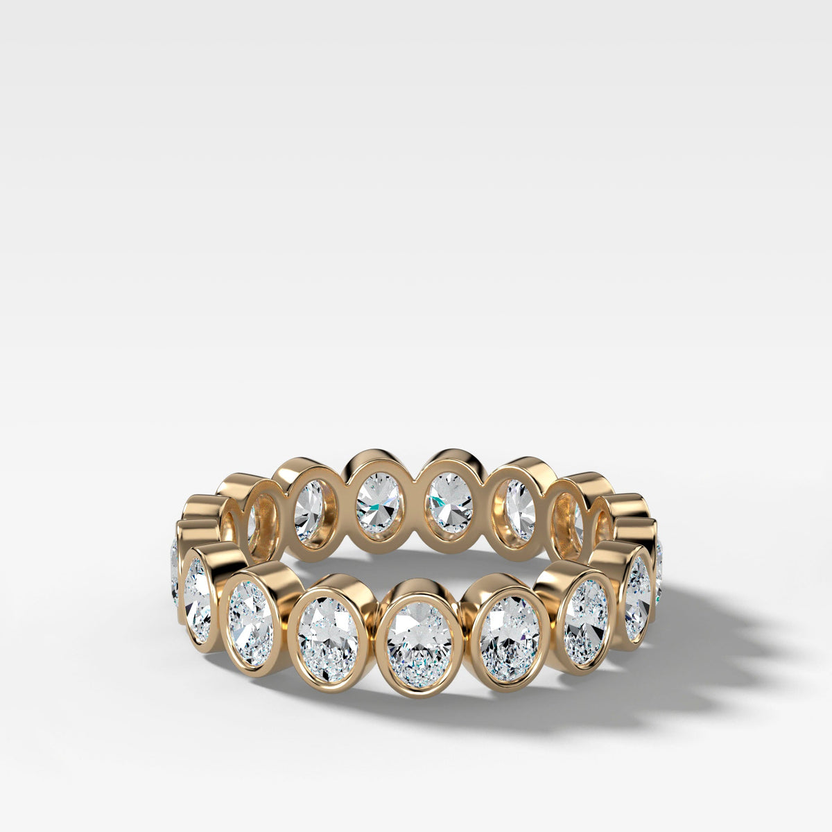 Baby Bezel Set Eternity Band With Oval Cuts in Yellow Gold by Good Stone
